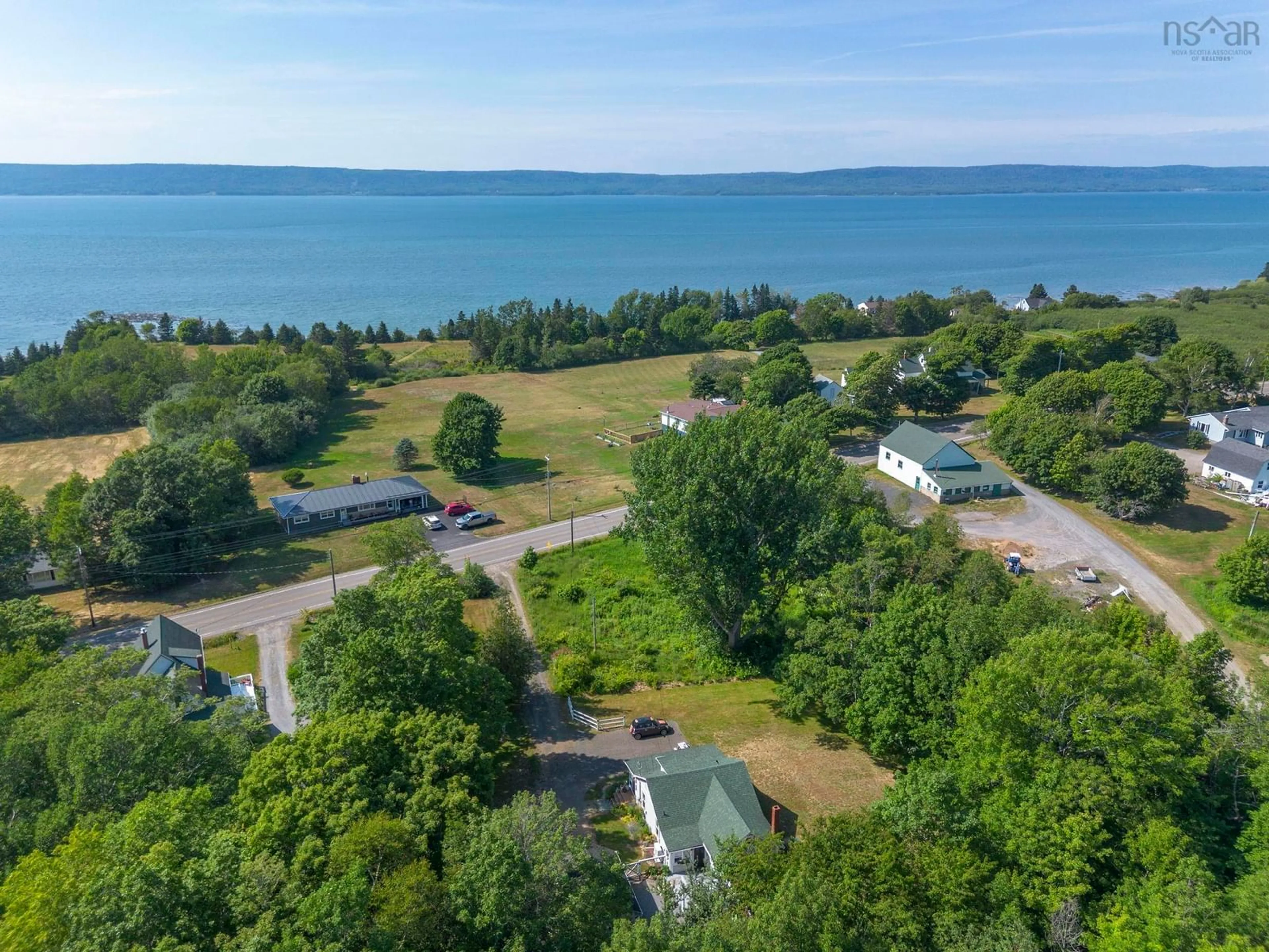 A pic from outside/outdoor area/front of a property/back of a property/a pic from drone, water/lake/river/ocean view for 772 Highway 1, Deep Brook Nova Scotia B0S 1J0