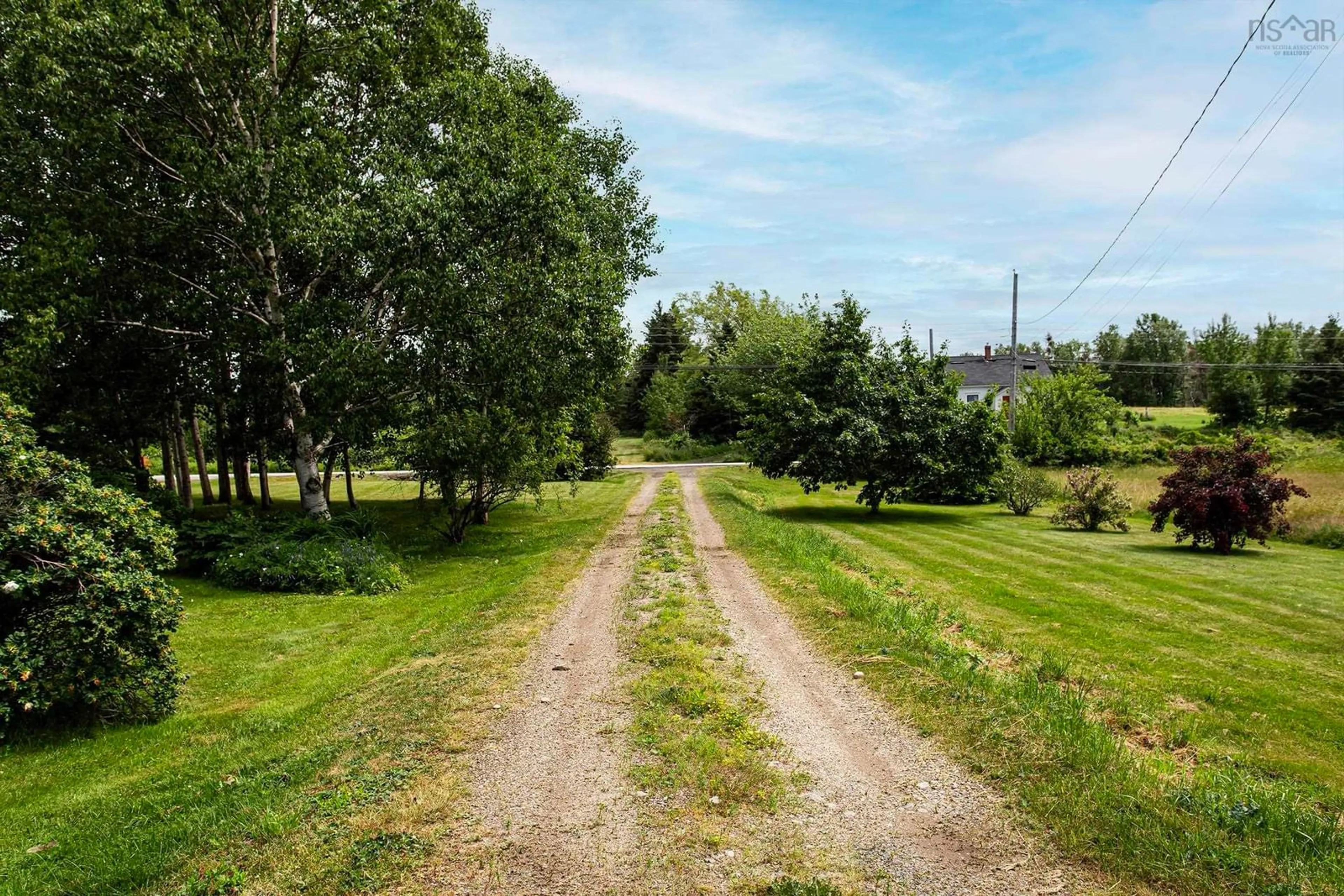 A pic from outside/outdoor area/front of a property/back of a property/a pic from drone, unknown for 8239 Shore Rd, Hampton Nova Scotia B0S 1L0