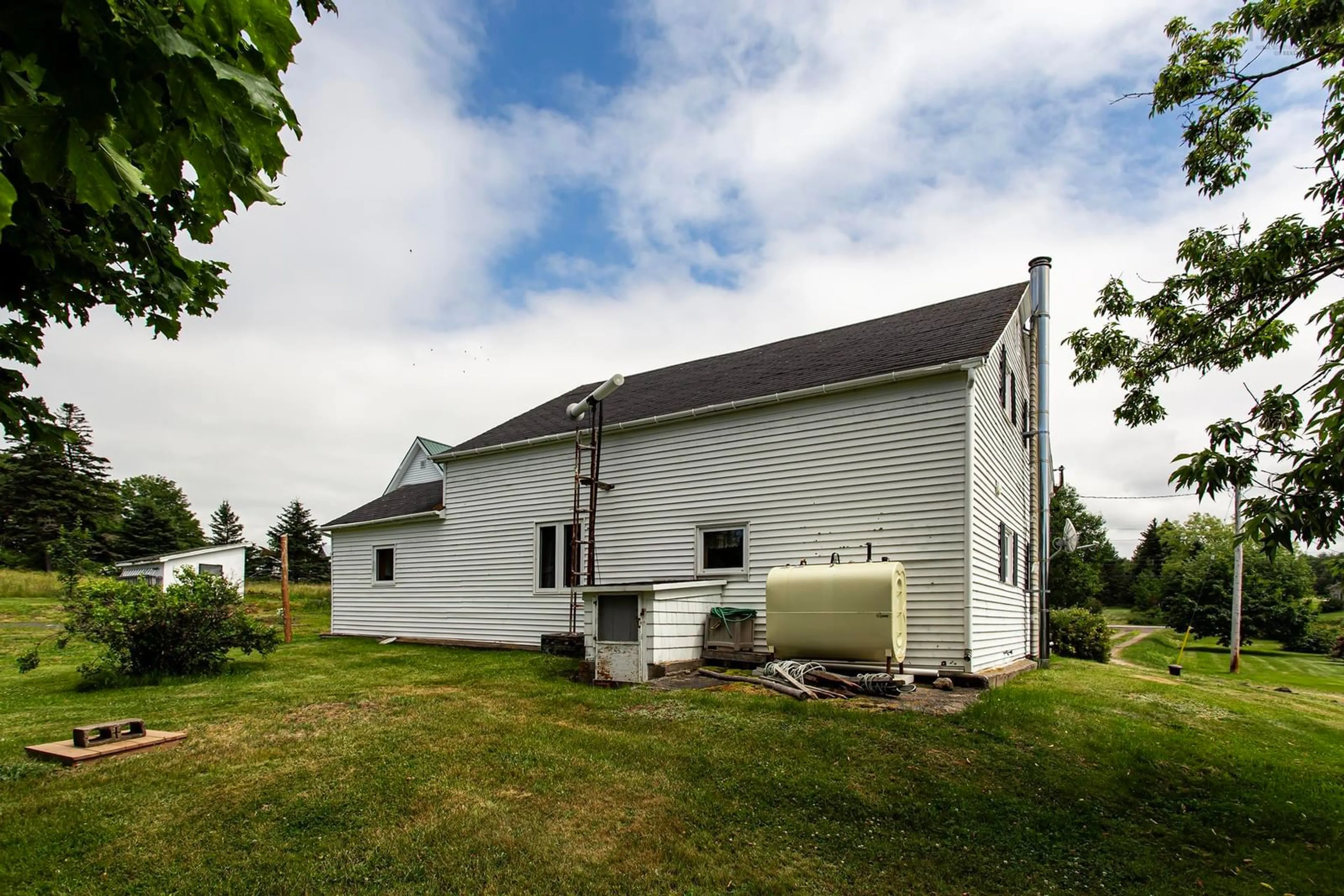 Home with vinyl exterior material, unknown for 8239 Shore Rd, Hampton Nova Scotia B0S 1L0