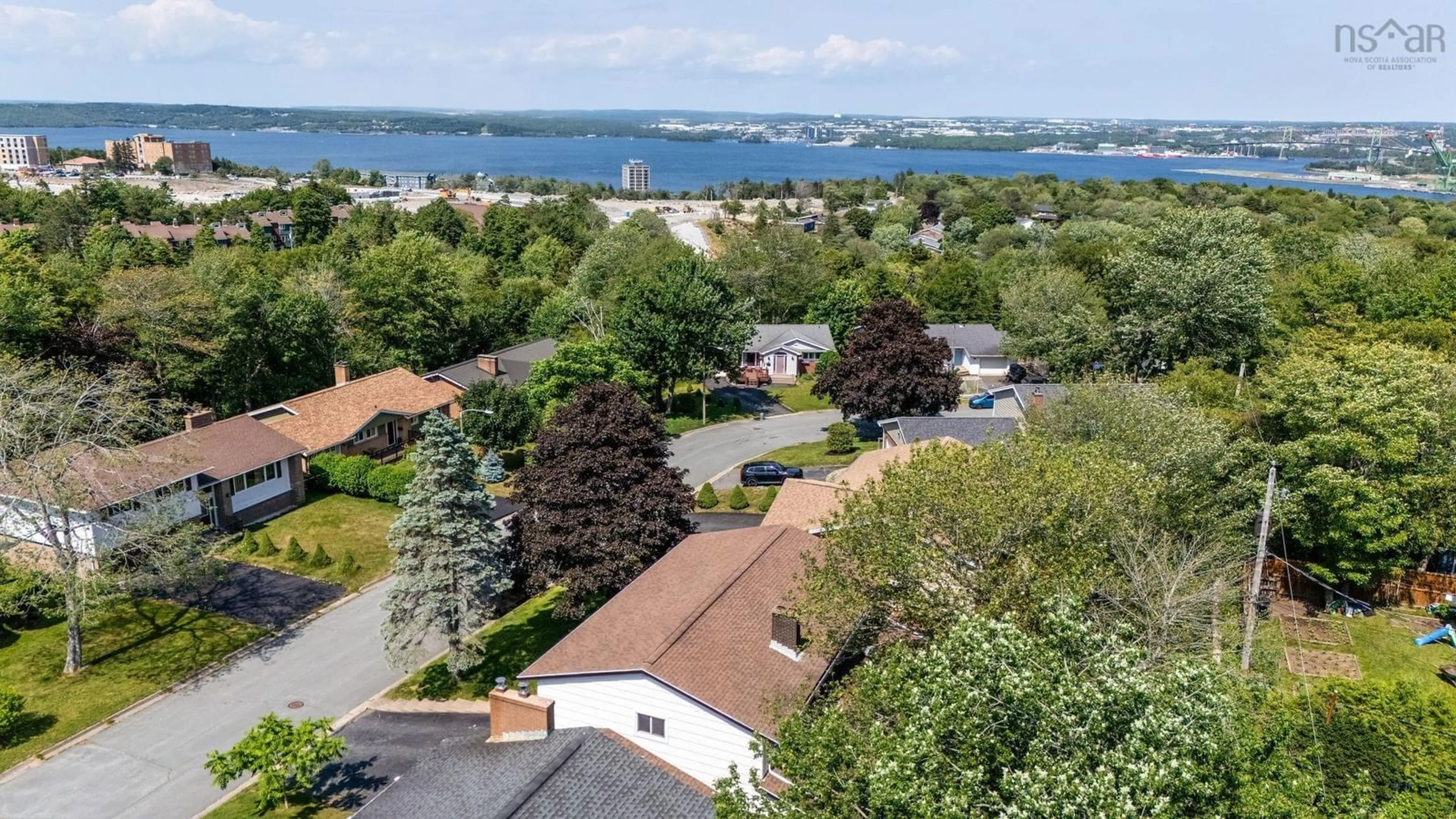 A pic from outside/outdoor area/front of a property/back of a property/a pic from drone, water/lake/river/ocean view for 22 Northcliffe Lane, Clayton Park Nova Scotia B3M 2Z6