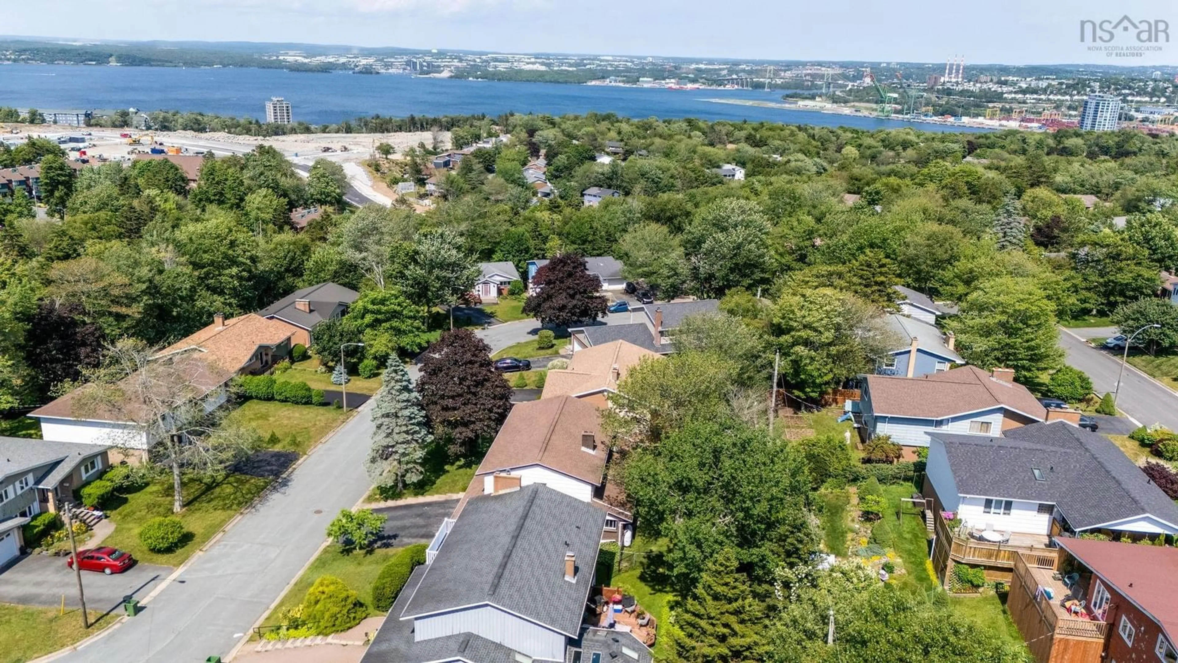 A pic from outside/outdoor area/front of a property/back of a property/a pic from drone, water/lake/river/ocean view for 22 Northcliffe Lane, Clayton Park Nova Scotia B3M 2Z6