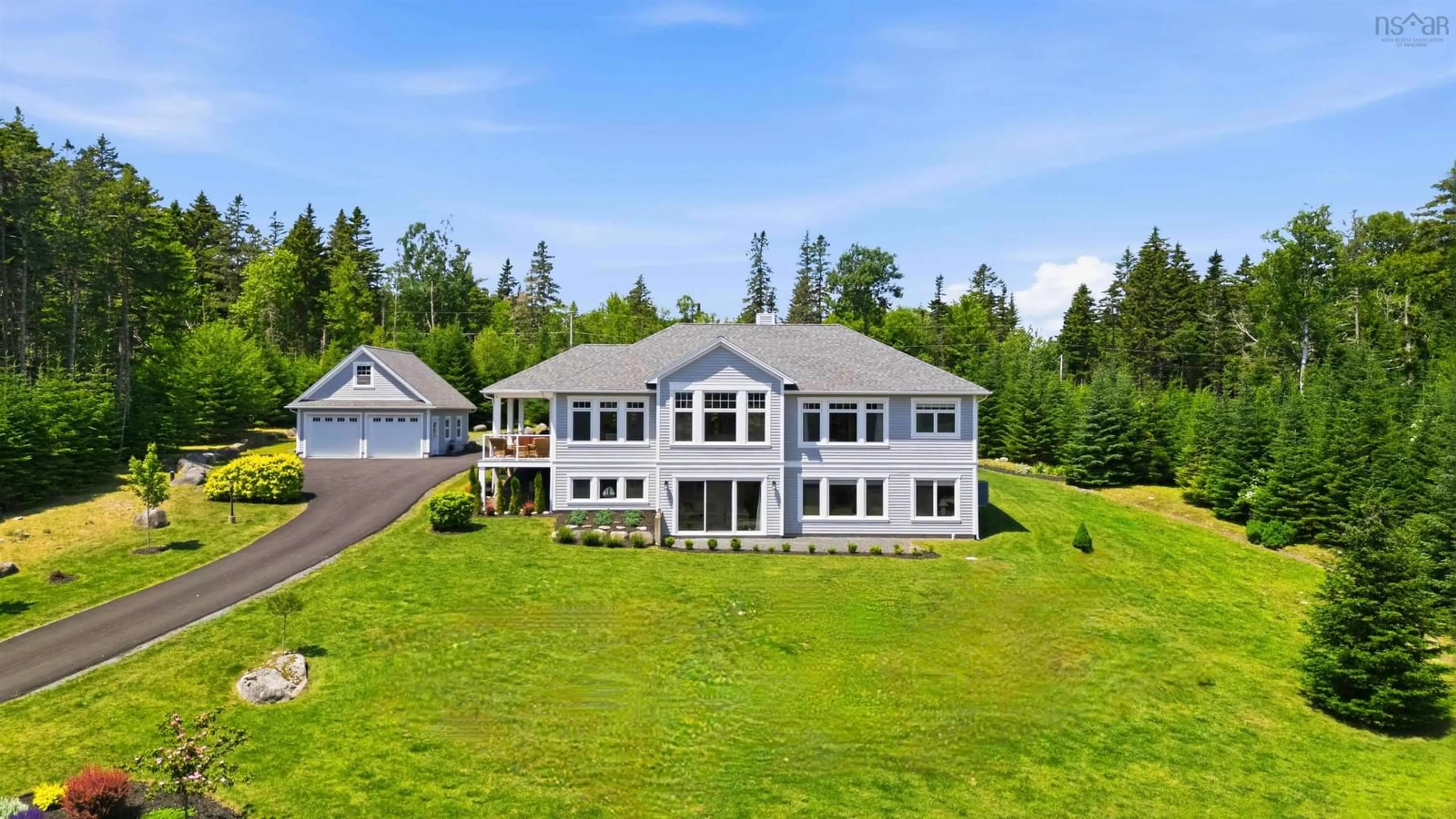 A pic from outside/outdoor area/front of a property/back of a property/a pic from drone, water/lake/river/ocean view for 50 Foxberry Hill, Glen Haven Nova Scotia B3Z 2W1