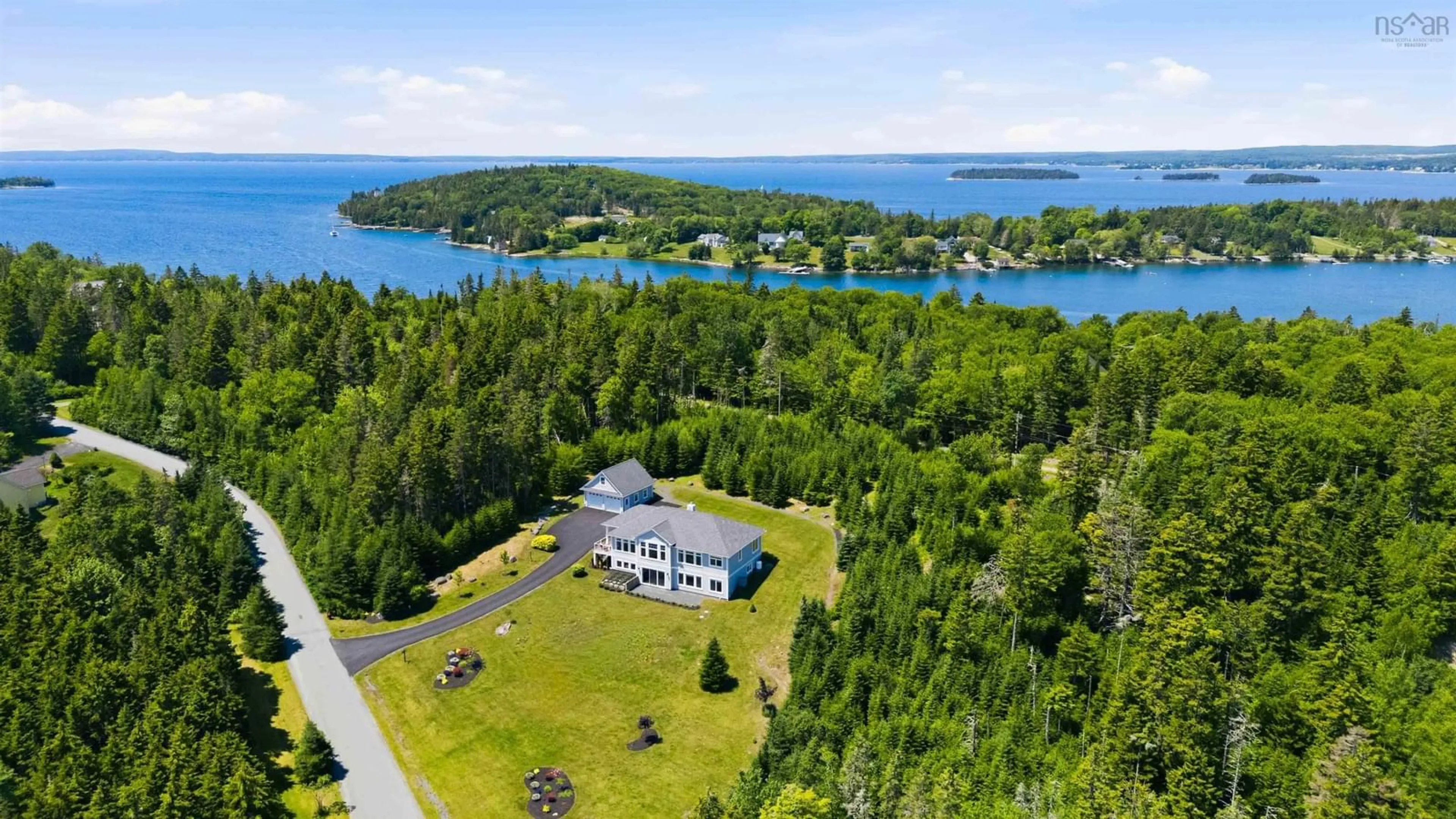A pic from outside/outdoor area/front of a property/back of a property/a pic from drone, water/lake/river/ocean view for 50 Foxberry Hill, Glen Haven Nova Scotia B3Z 2W1