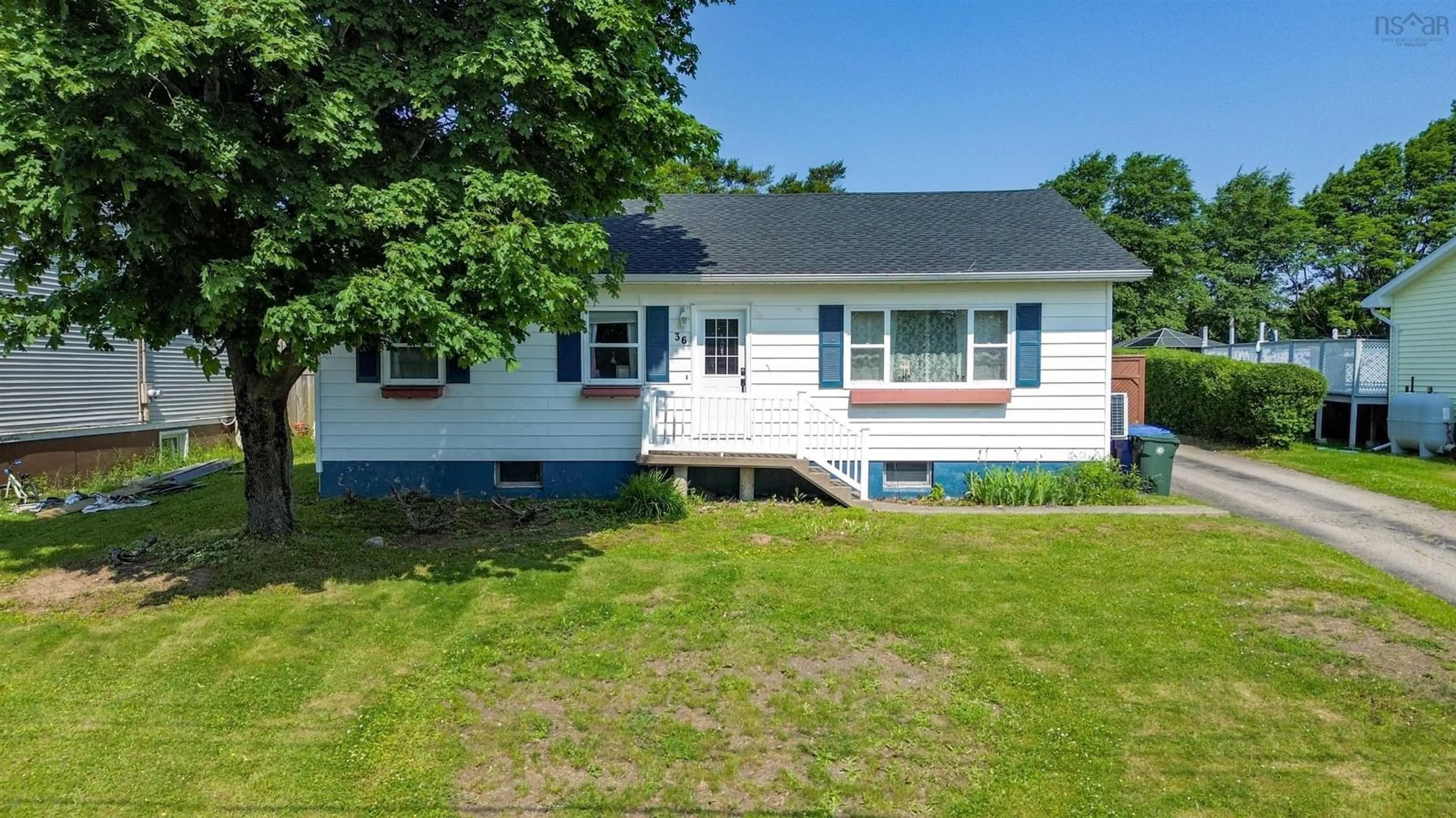Home with vinyl exterior material, street for 36 Holic Ave, North Sydney Nova Scotia B2A 3R8