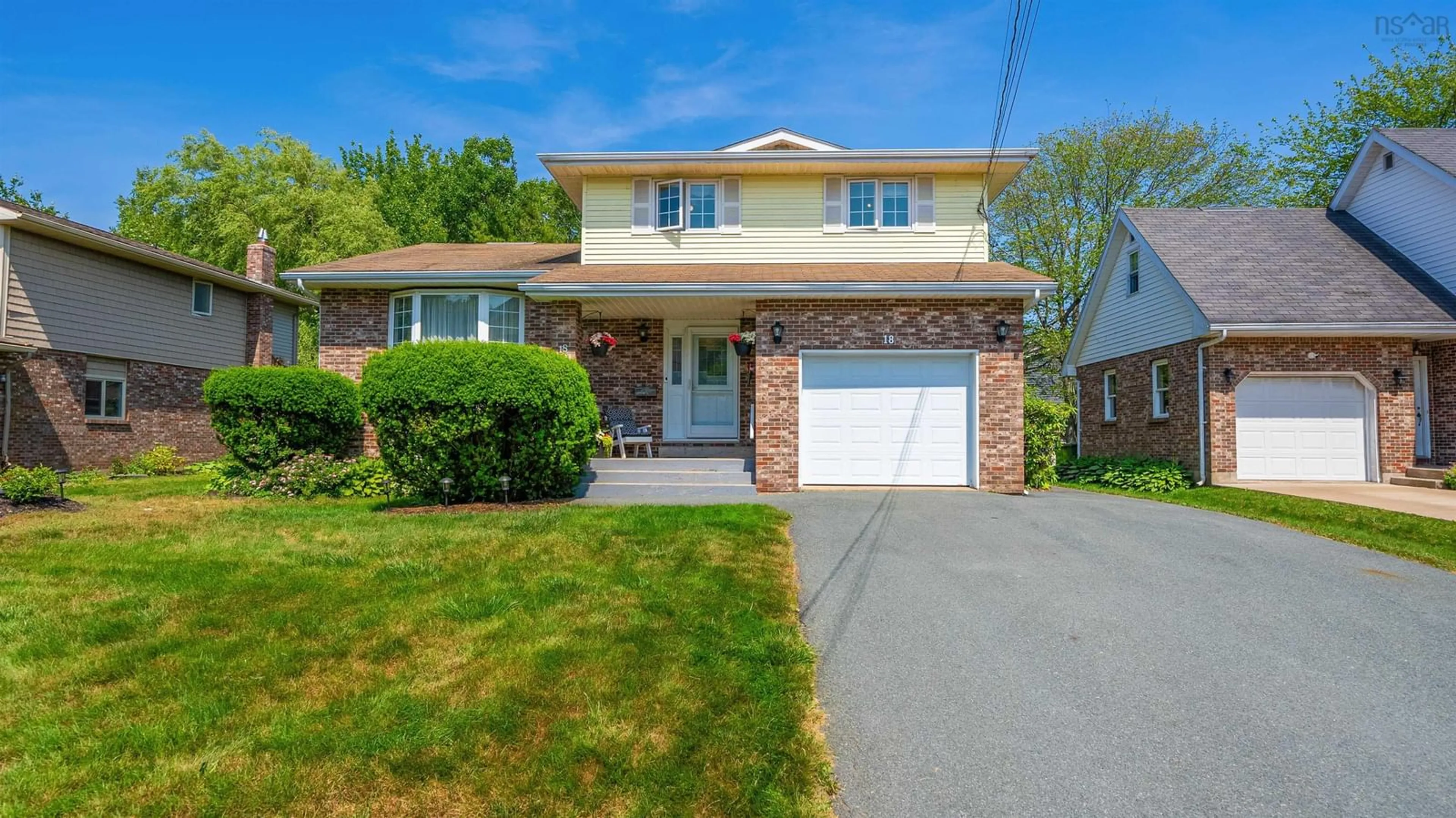 Home with vinyl exterior material, street for 18 Flagstone Dr, Colby Nova Scotia B2V 1Z8