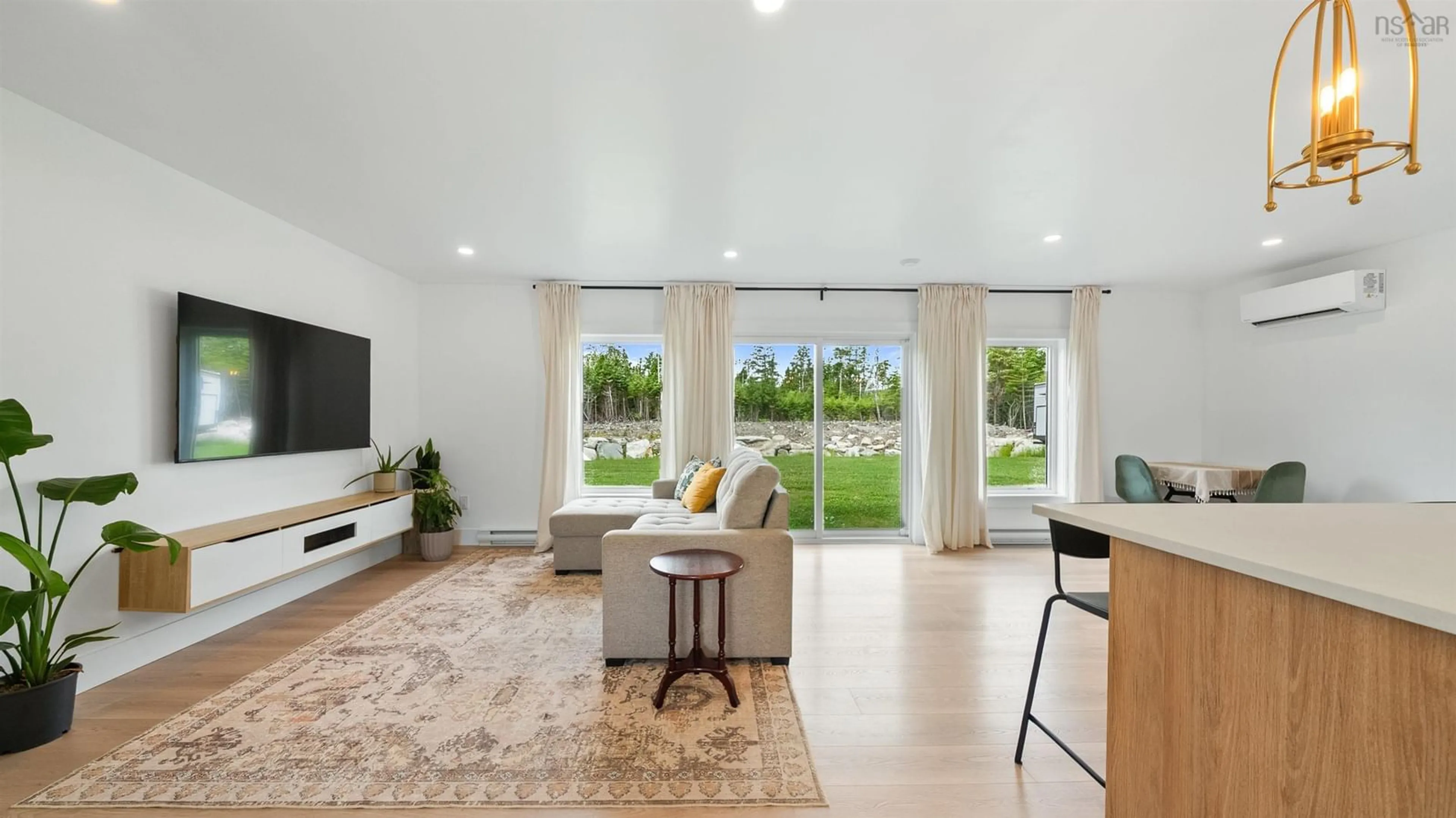 Living room with furniture, unknown for 3541 Clam Harbour Rd, Clam Harbour Nova Scotia B0J 2L0