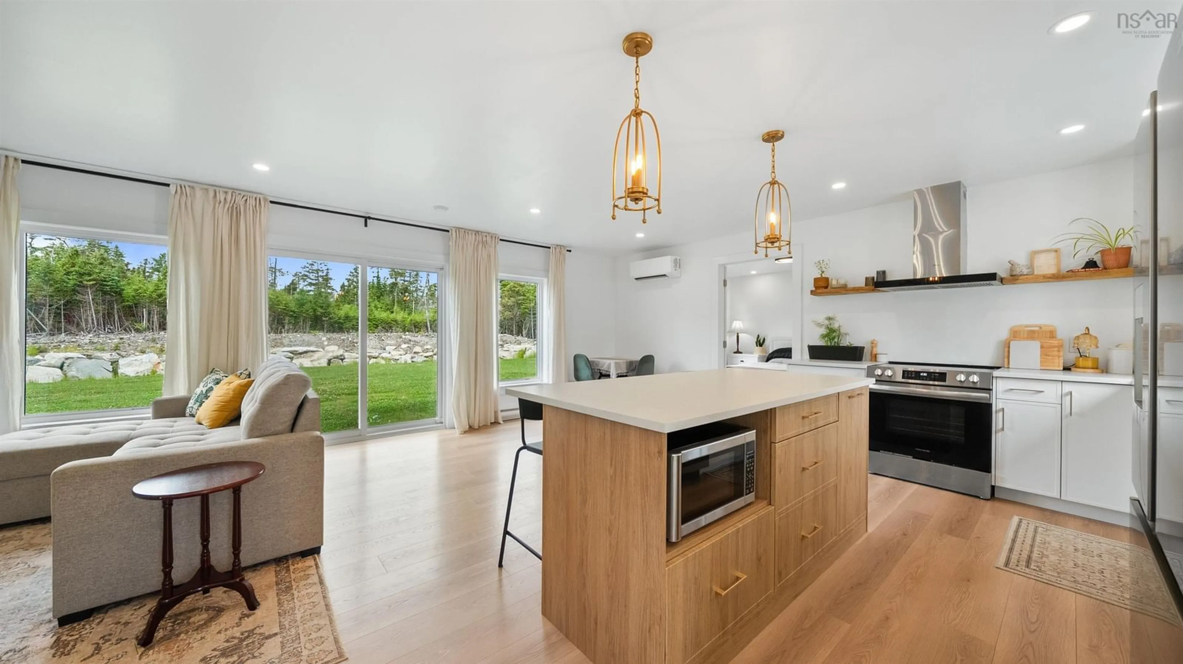 Open concept kitchen, ceramic/tile floor for 3541 Clam Harbour Rd, Clam Harbour Nova Scotia B0J 2L0