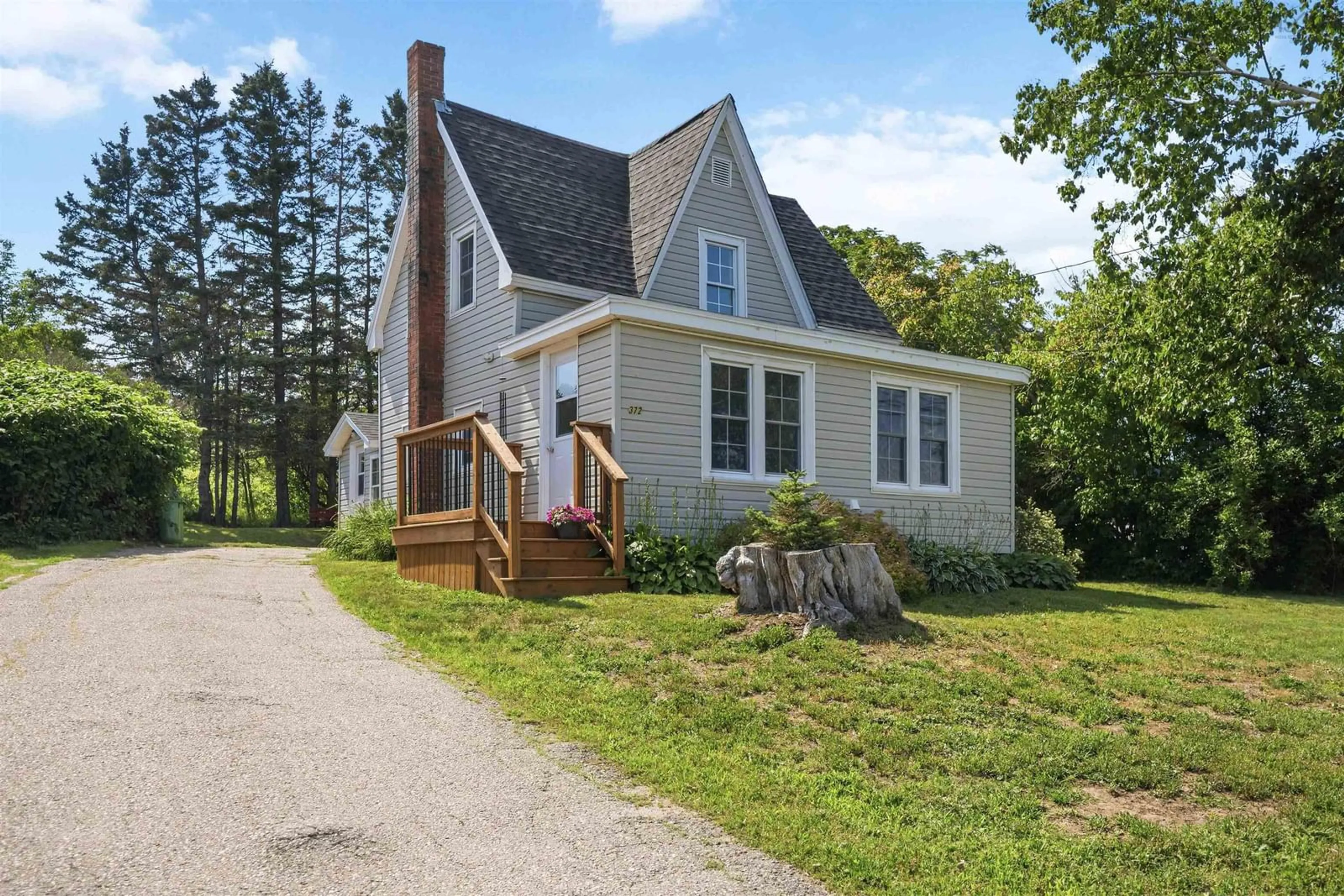 Home with vinyl exterior material, street for 372 Highway 303, Conway Nova Scotia B0V 1A0
