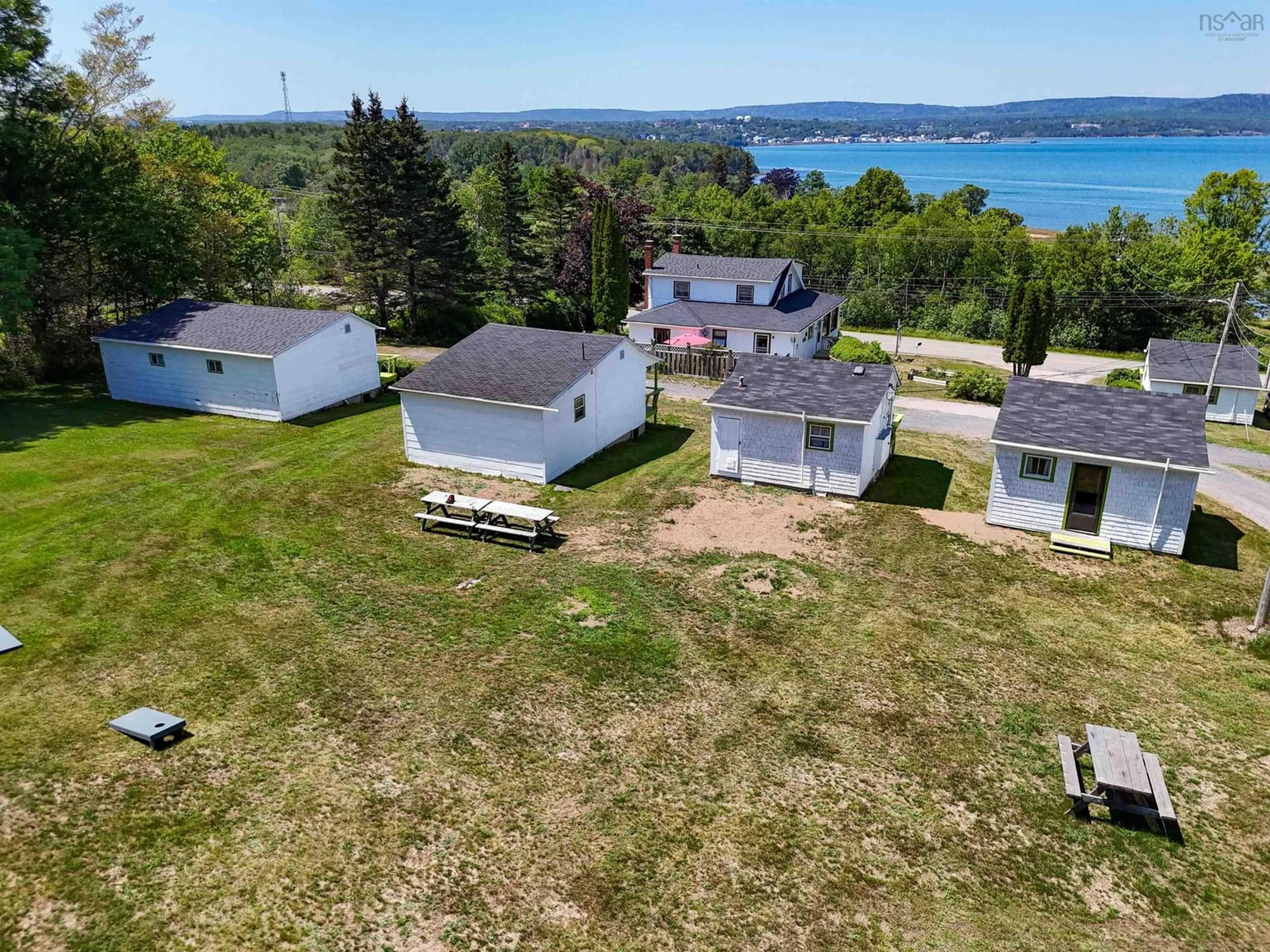A pic from outside/outdoor area/front of a property/back of a property/a pic from drone, water/lake/river/ocean view for 234 Highway 1, Smiths Cove Nova Scotia B0S 1S0