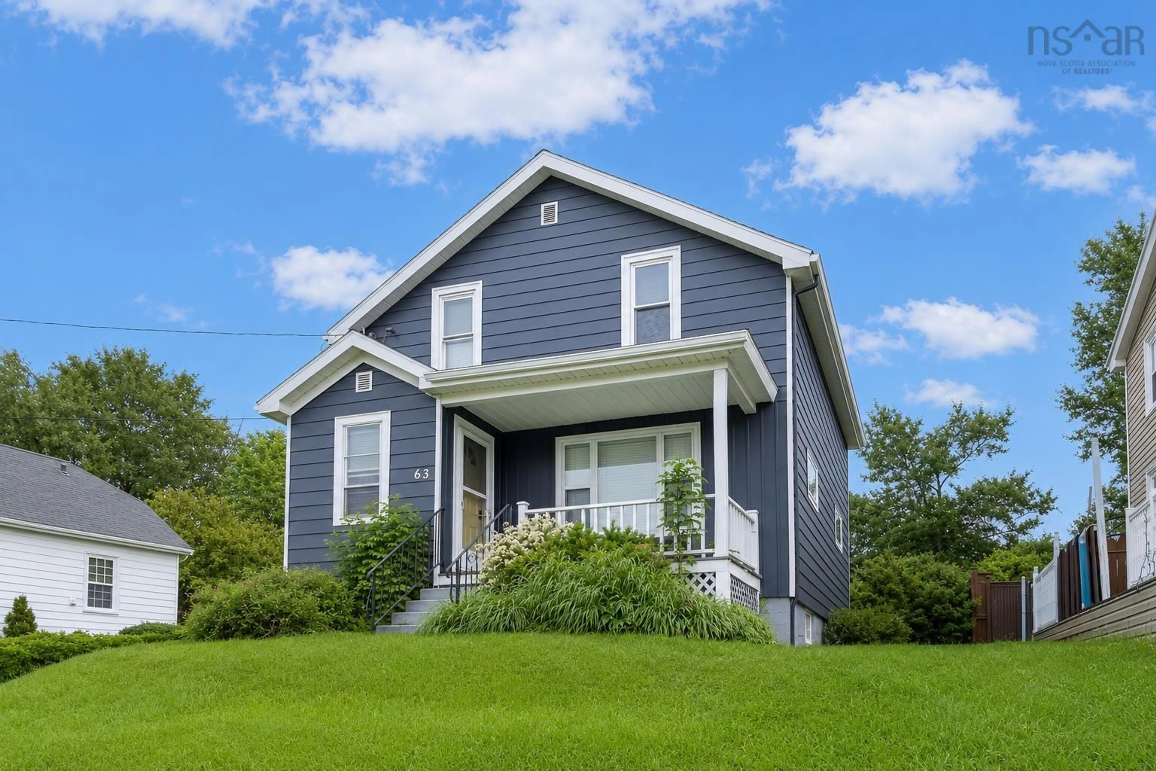 Home with vinyl exterior material, street for 63 Sutherland St, Sydney Nova Scotia B1P 2X1