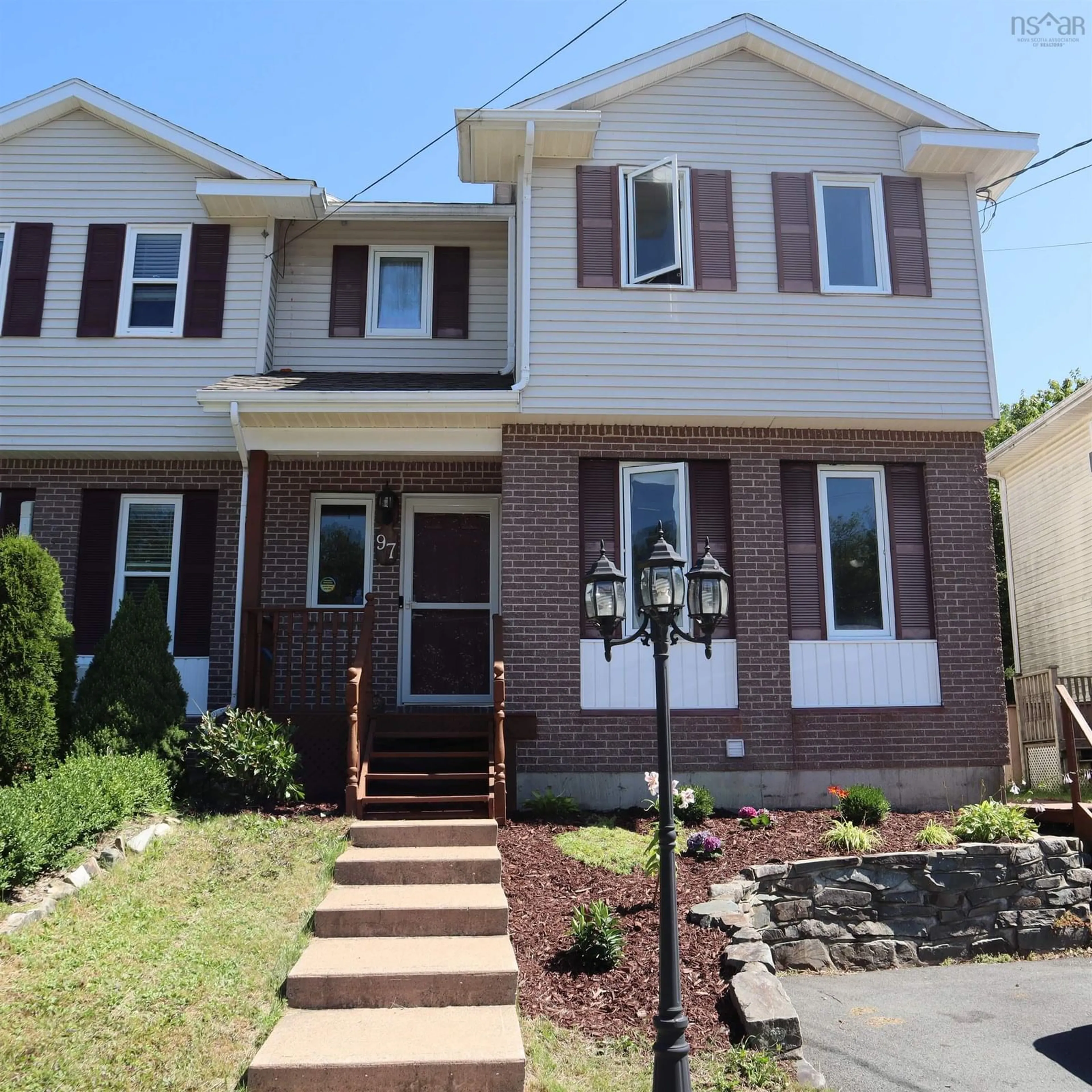 Home with vinyl exterior material, street for 97 Bruce Dr, Sackville Nova Scotia B4C 3V2