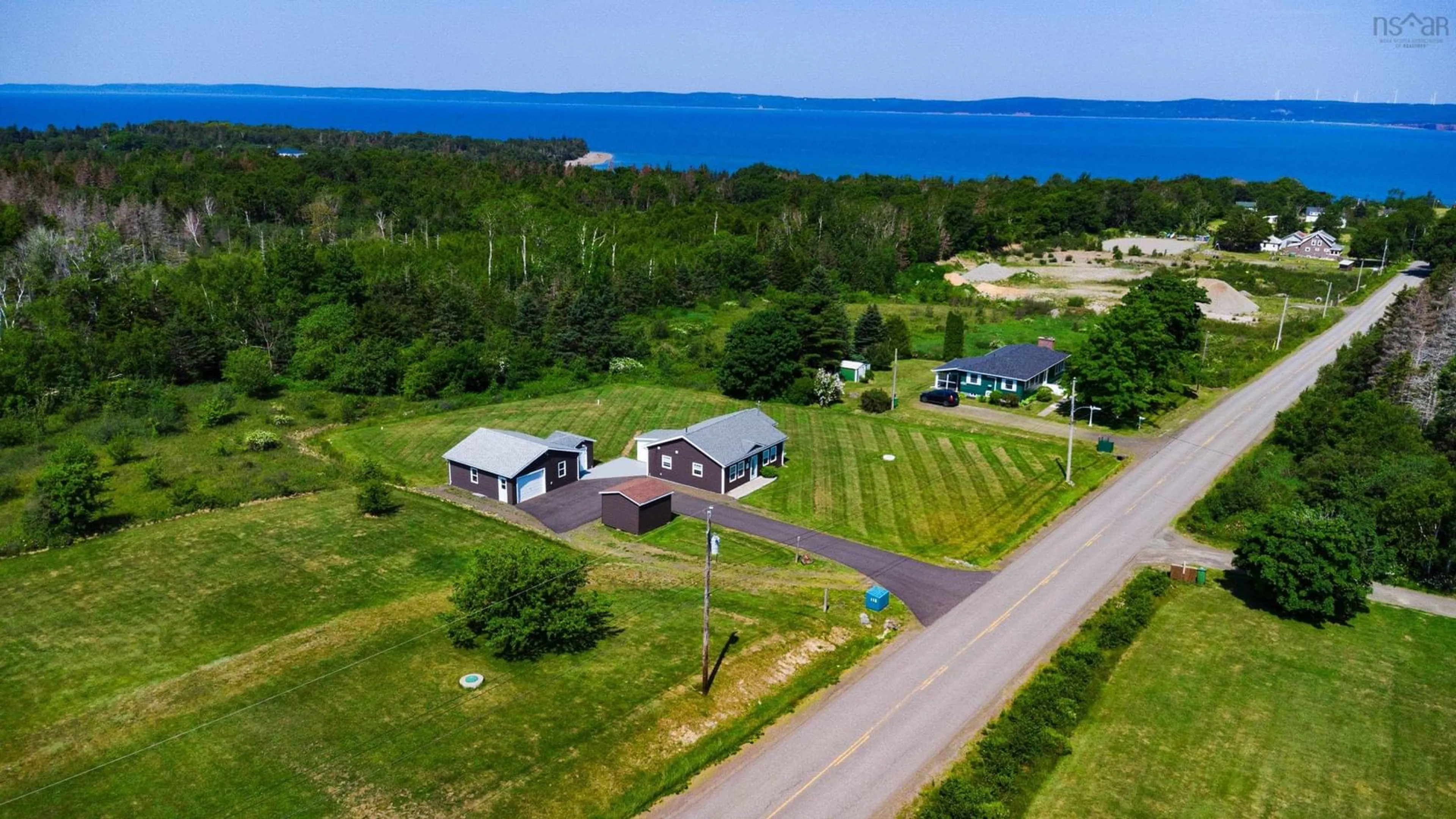 A pic from outside/outdoor area/front of a property/back of a property/a pic from drone, water/lake/river/ocean view for 112 North Range Cross Road, Barton Nova Scotia B0W 1H0