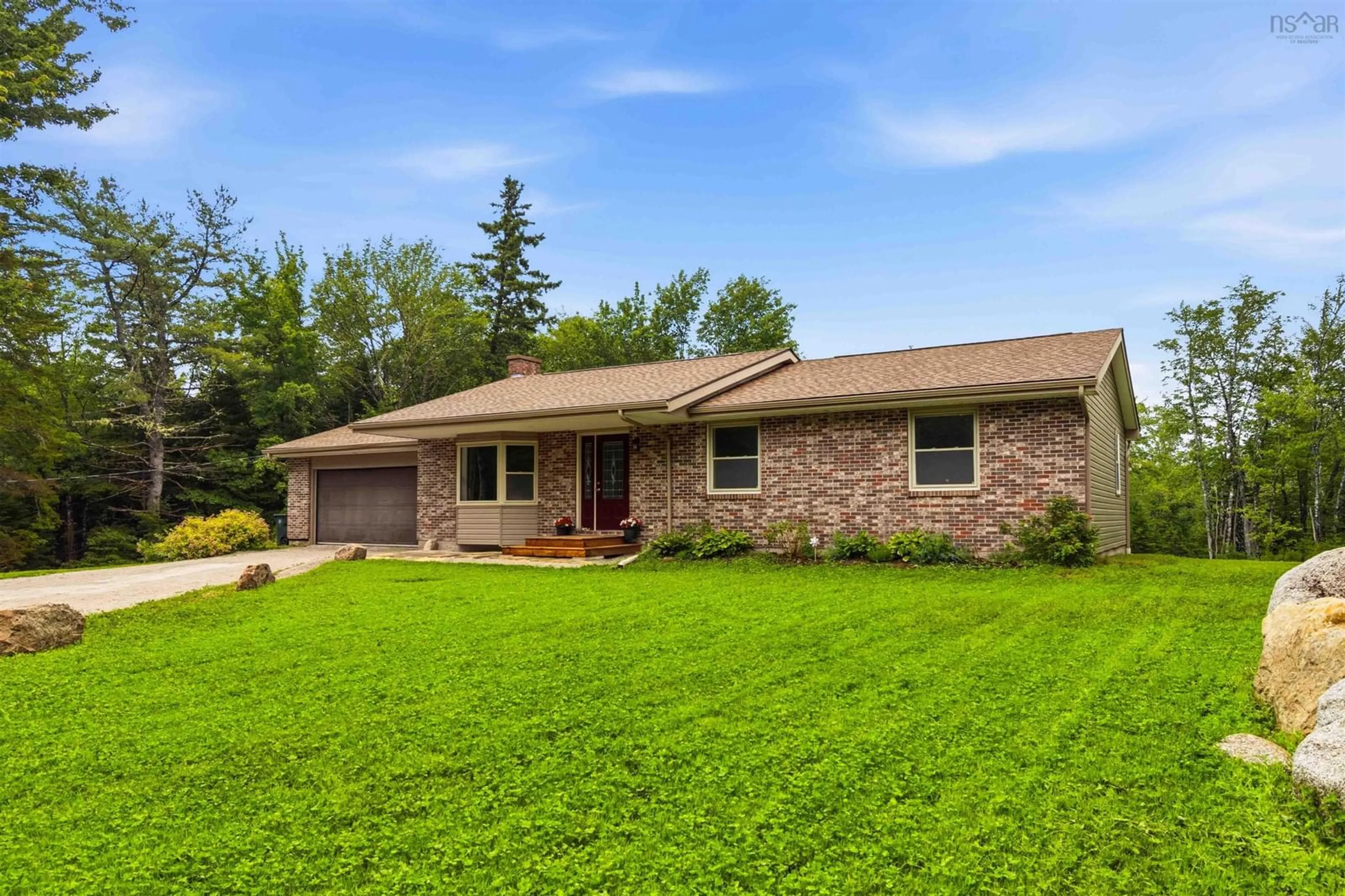 Home with brick exterior material, street for 45 Isaac Jennings Dr, Mill Cove Nova Scotia B0J 1T0