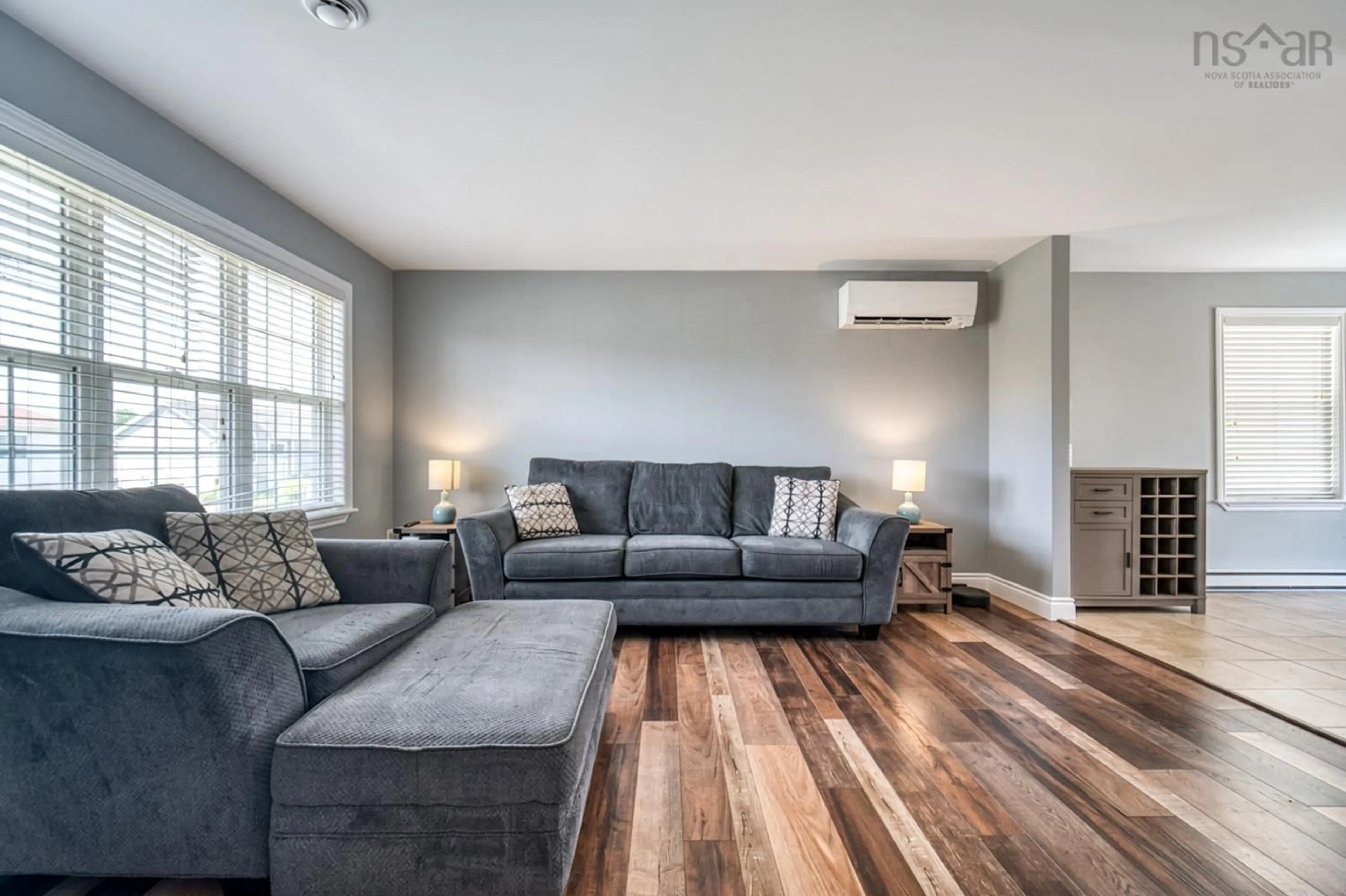 Living room with furniture, wood/laminate floor for 71 Keyport Ave, Eastern Passage Nova Scotia B3G 0C2