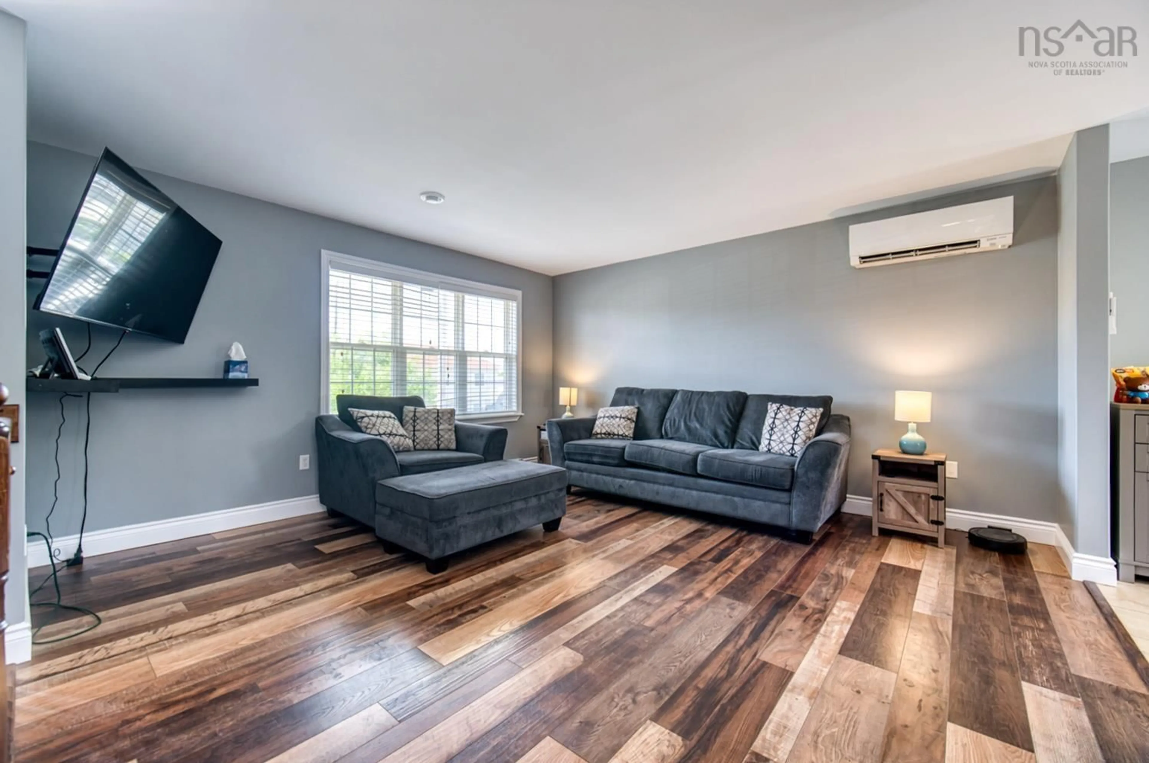 Living room with furniture, wood/laminate floor for 71 Keyport Ave, Eastern Passage Nova Scotia B3G 0C2