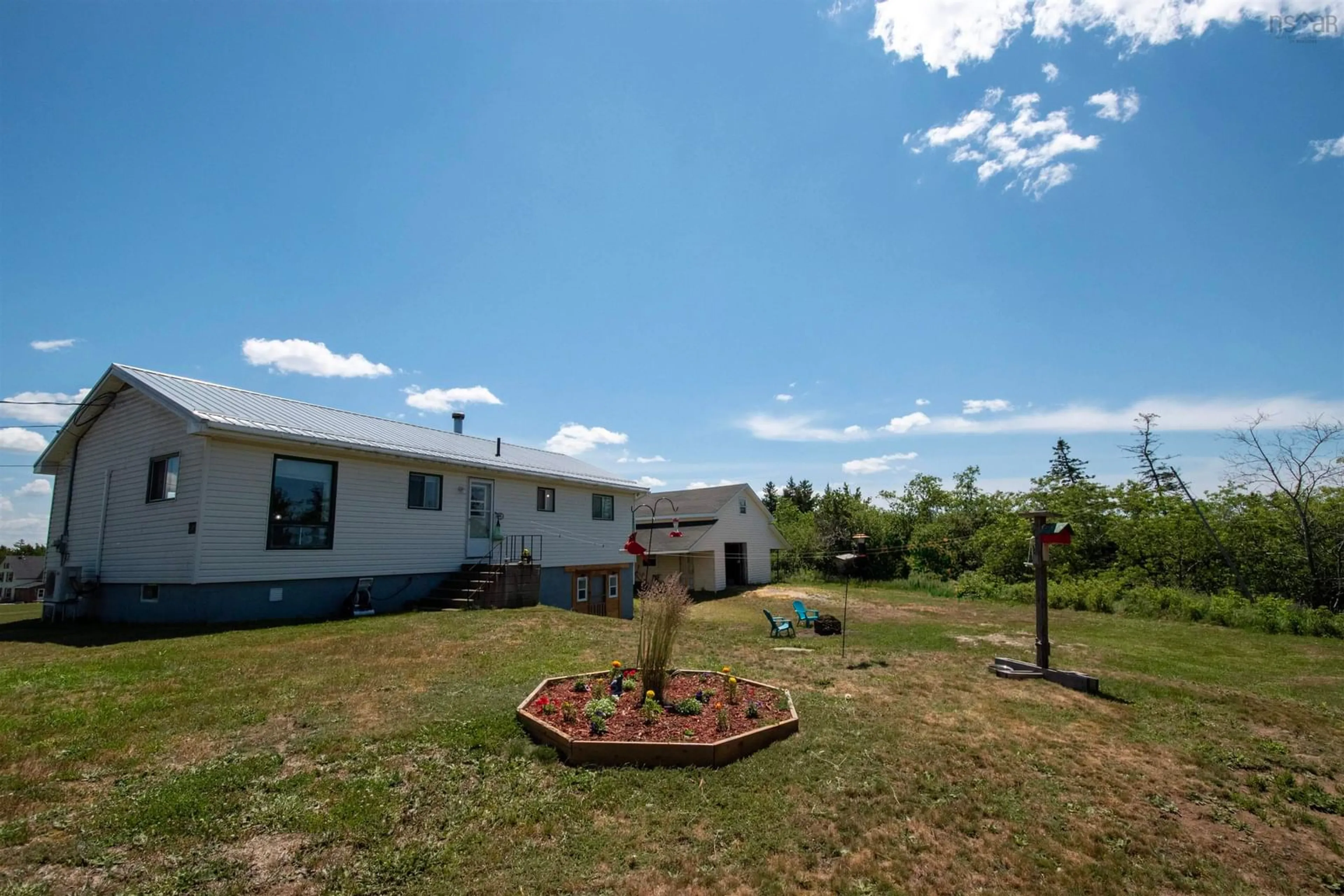 A pic from outside/outdoor area/front of a property/back of a property/a pic from drone, unknown for 27 Chemin De La Bloquine, Amiraults Hill Nova Scotia B0W 3M0