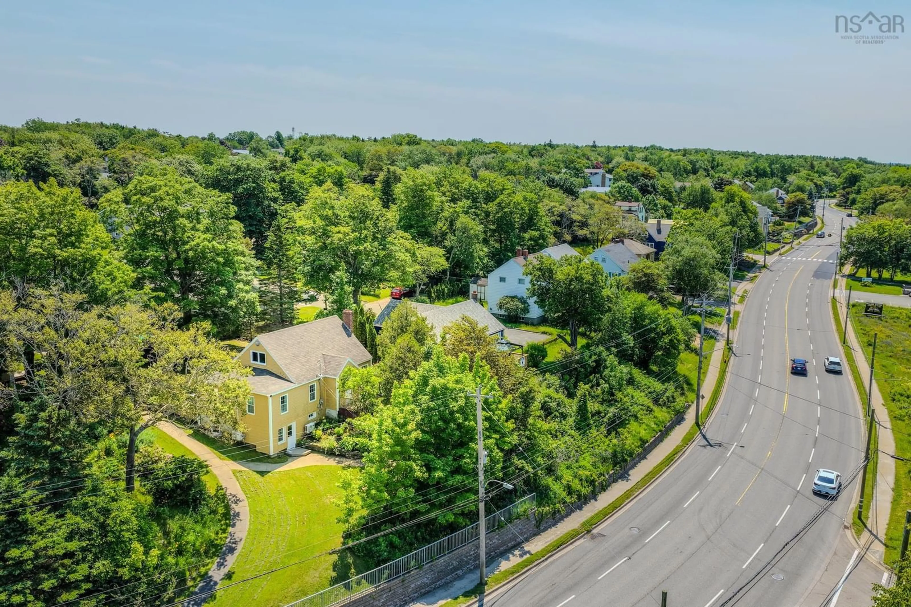 A pic from outside/outdoor area/front of a property/back of a property/a pic from drone, unknown for 587 Kings Rd, Sydney Nova Scotia B1S 1B8