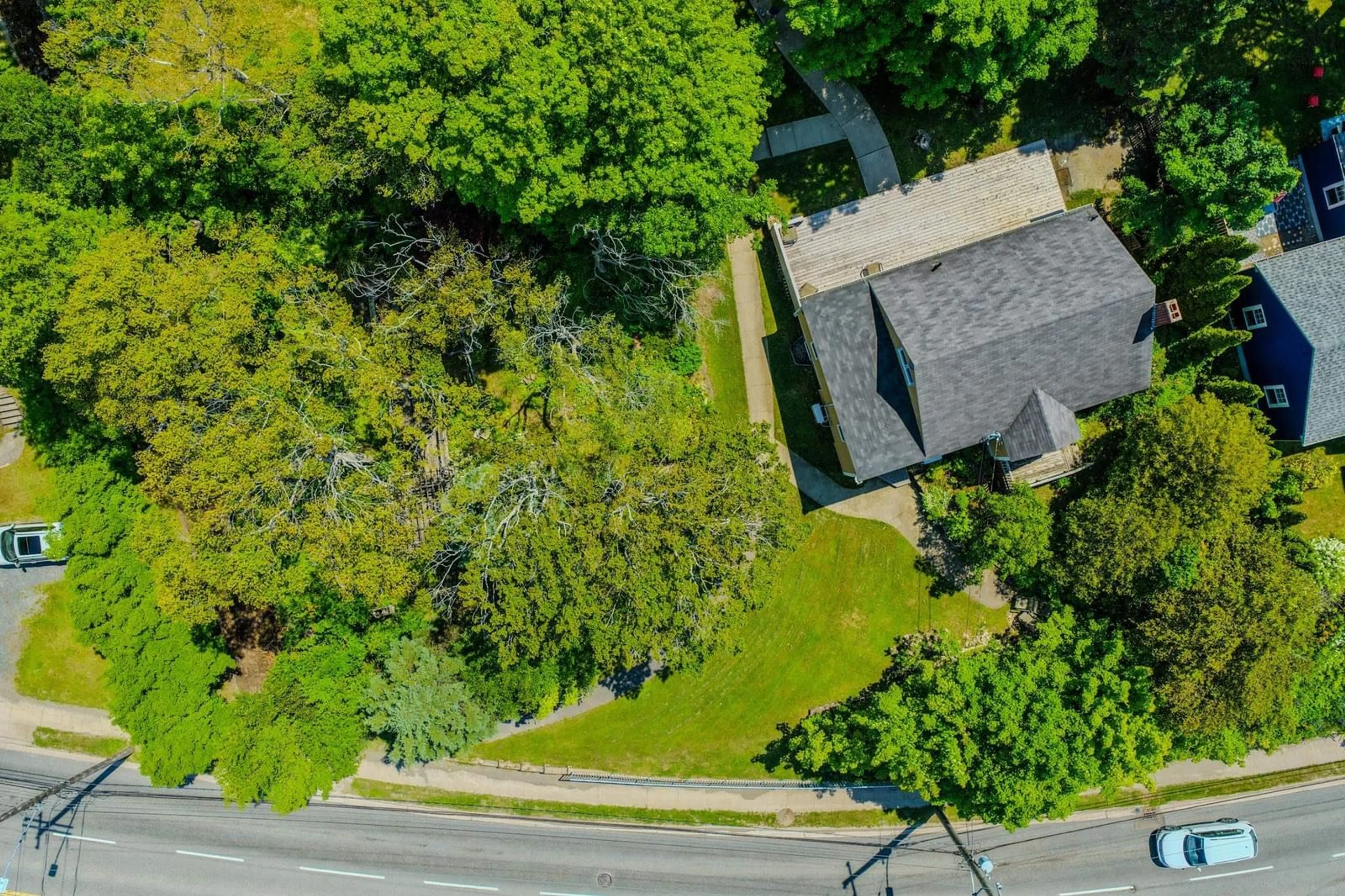 A pic from outside/outdoor area/front of a property/back of a property/a pic from drone, street for 587 Kings Rd, Sydney Nova Scotia B1S 1B8