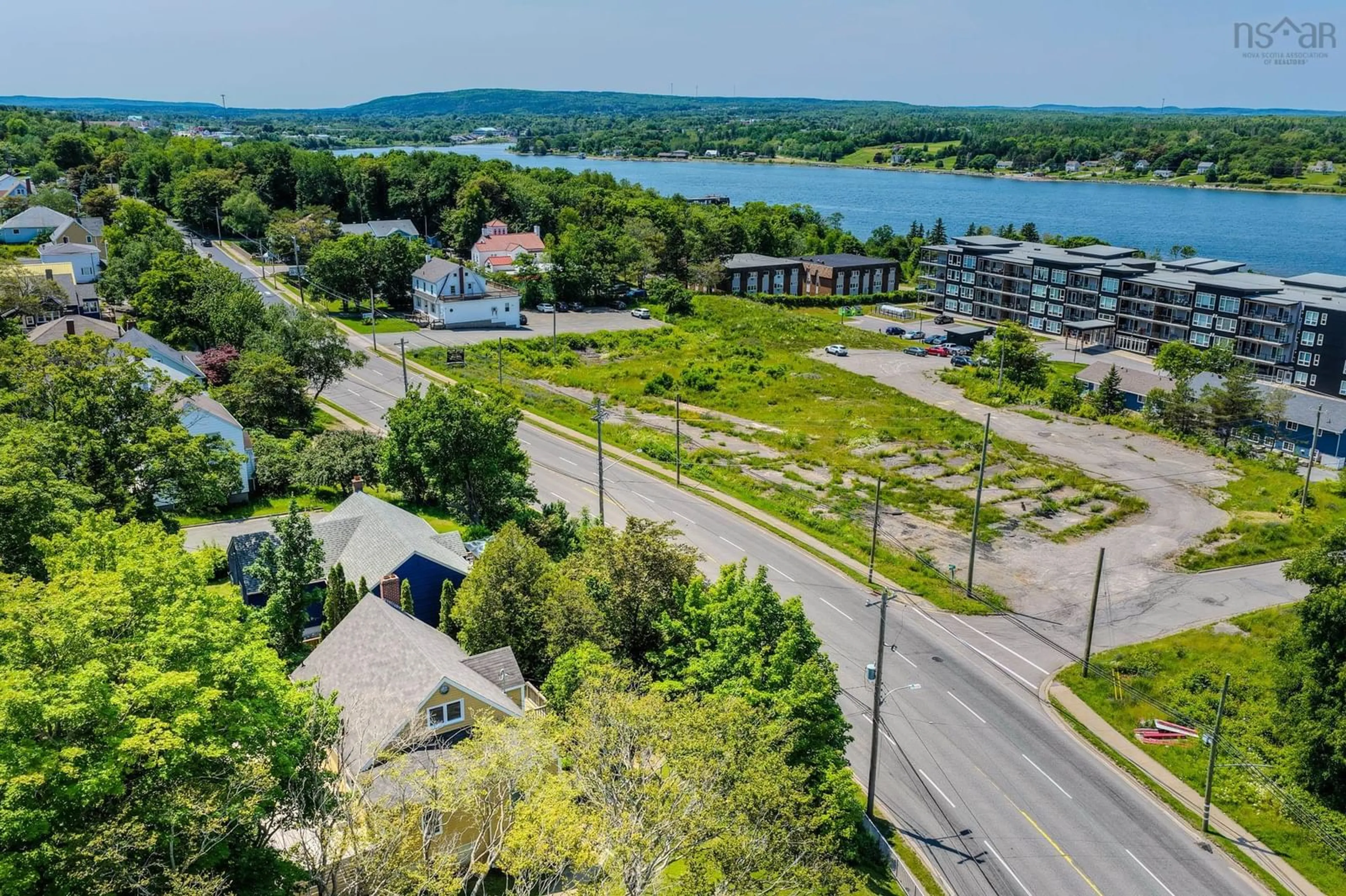 A pic from outside/outdoor area/front of a property/back of a property/a pic from drone, water/lake/river/ocean view for 587 Kings Rd, Sydney Nova Scotia B1S 1B8