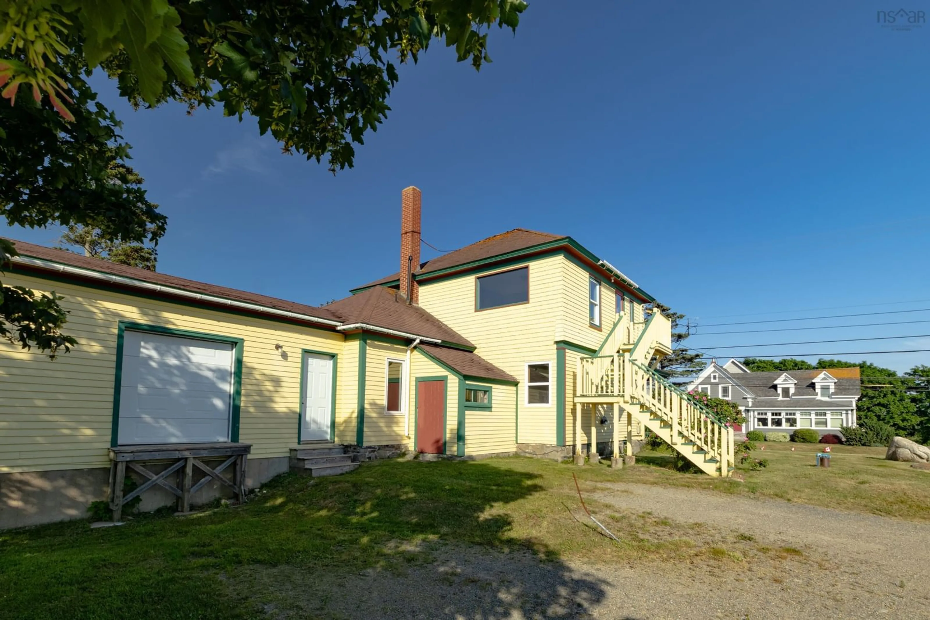 A pic from outside/outdoor area/front of a property/back of a property/a pic from drone, building for 1813 Highway 1, Church Point Nova Scotia B0W 1M0