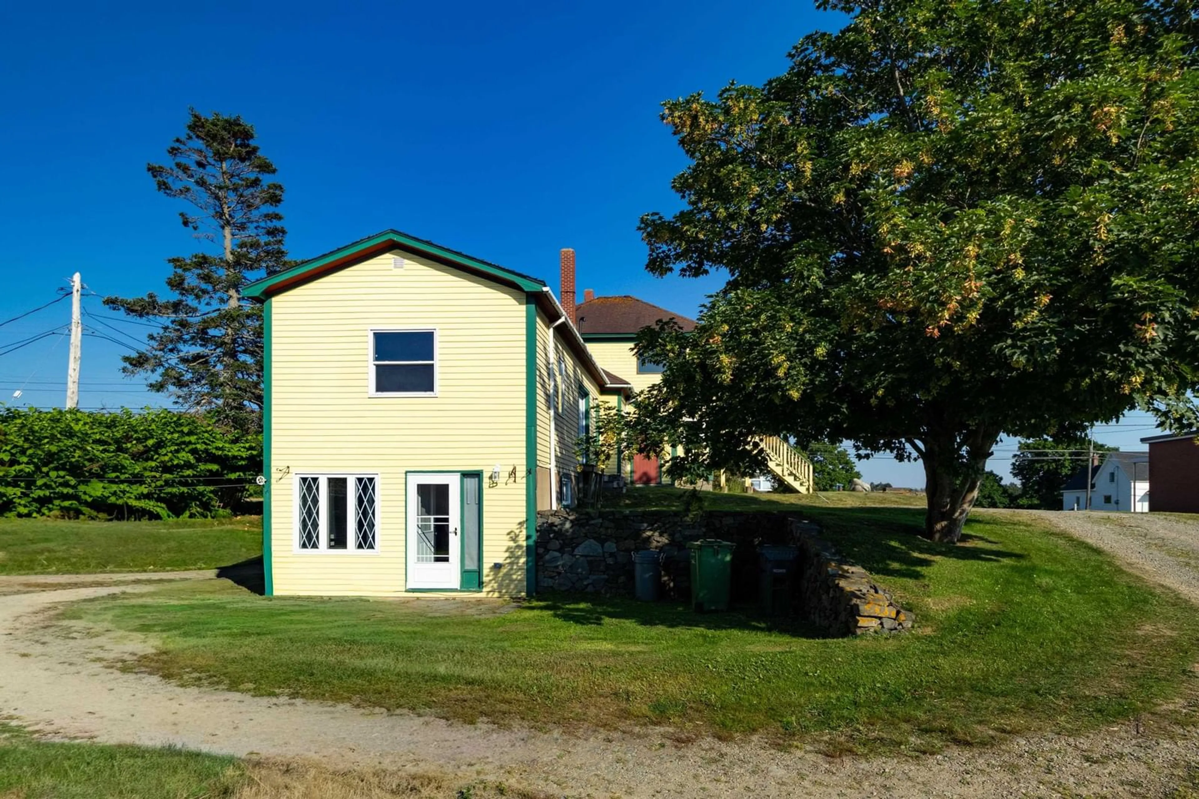 A pic from outside/outdoor area/front of a property/back of a property/a pic from drone, building for 1813 Highway 1, Church Point Nova Scotia B0W 1M0