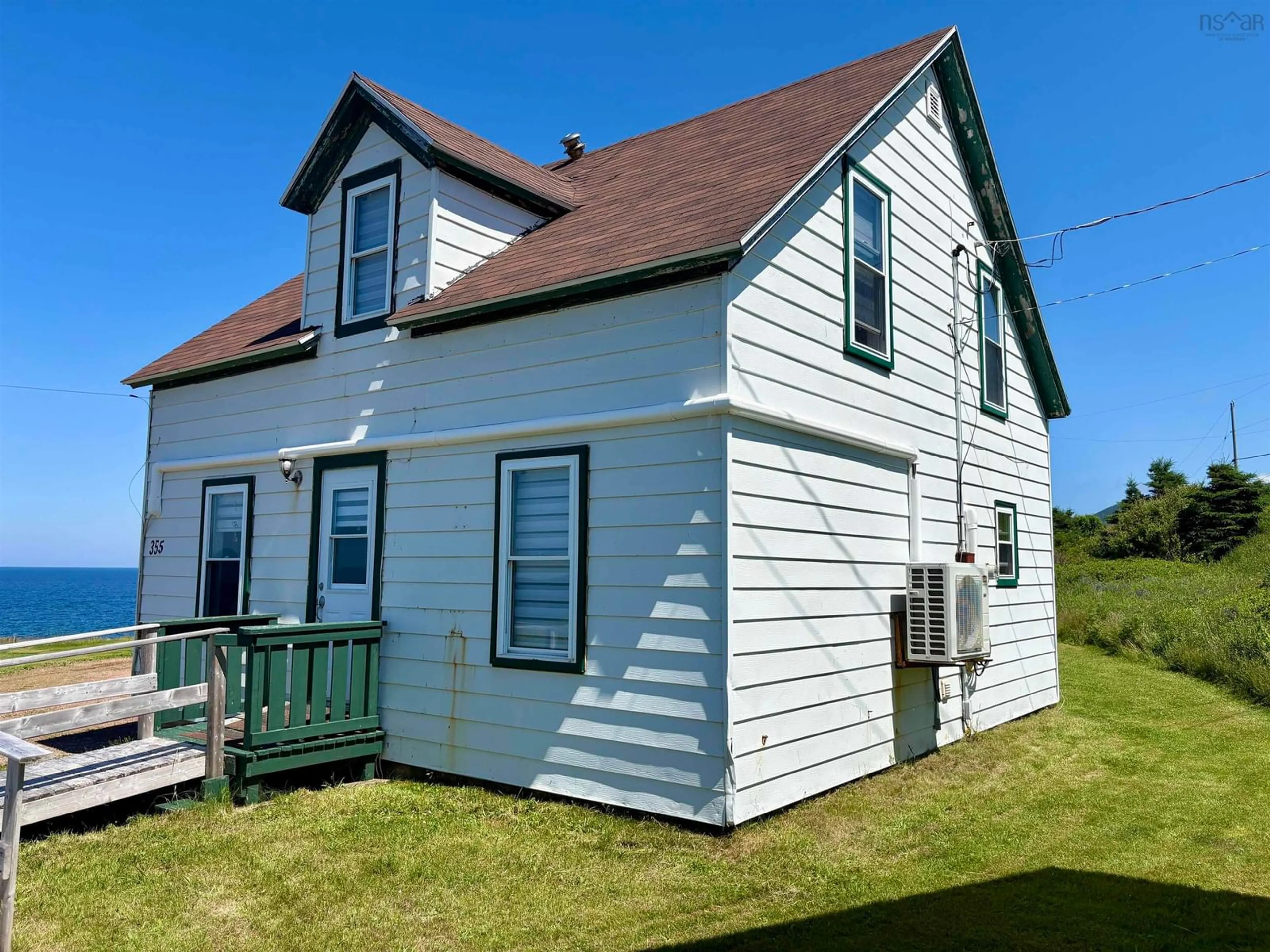 Home with vinyl exterior material, building for 355 Red River Rd., Pleasant Bay Nova Scotia B0E 2P0