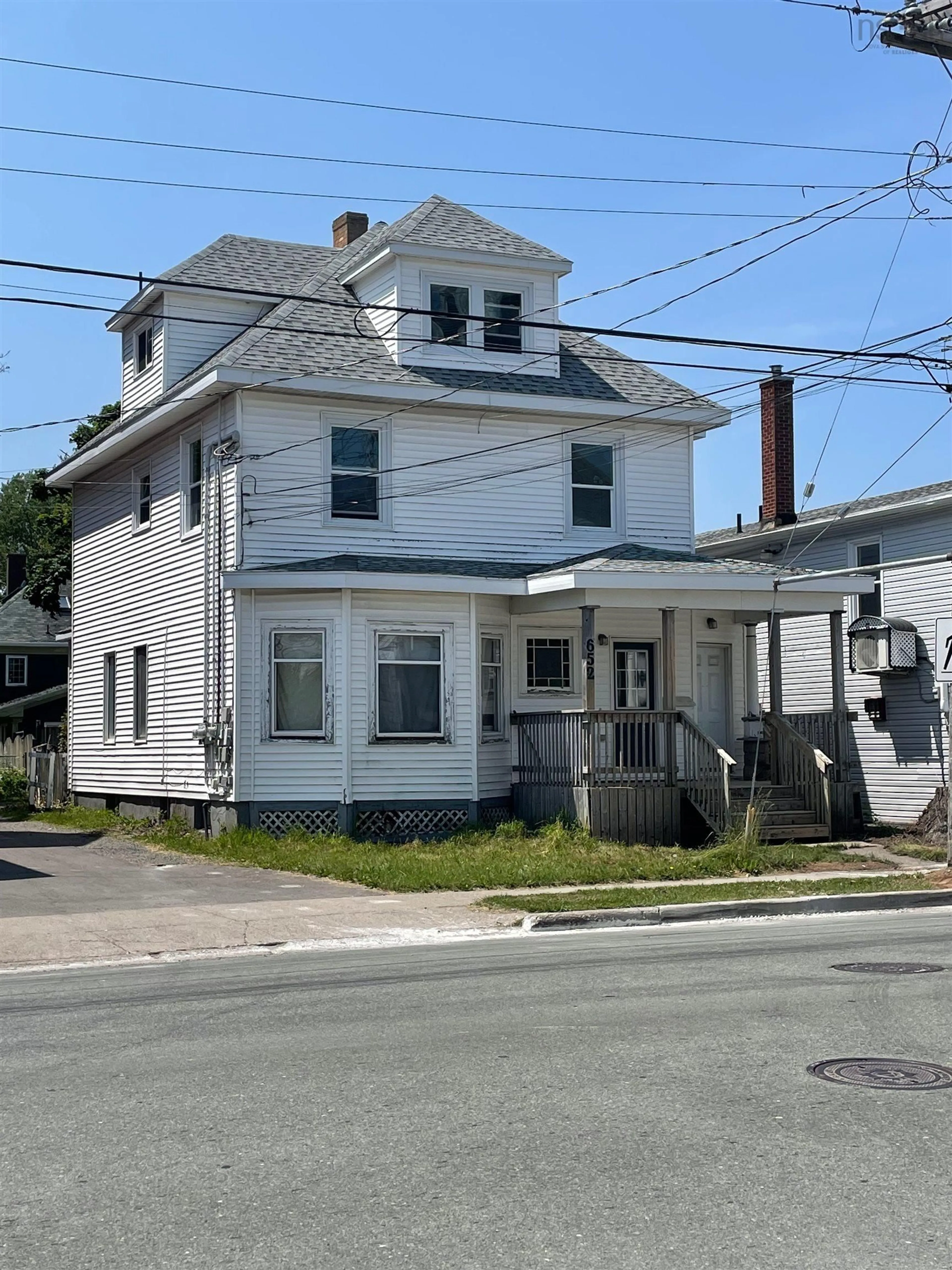 Home with vinyl exterior material, street for 652 George Street, Sydney Nova Scotia B1P 1K9