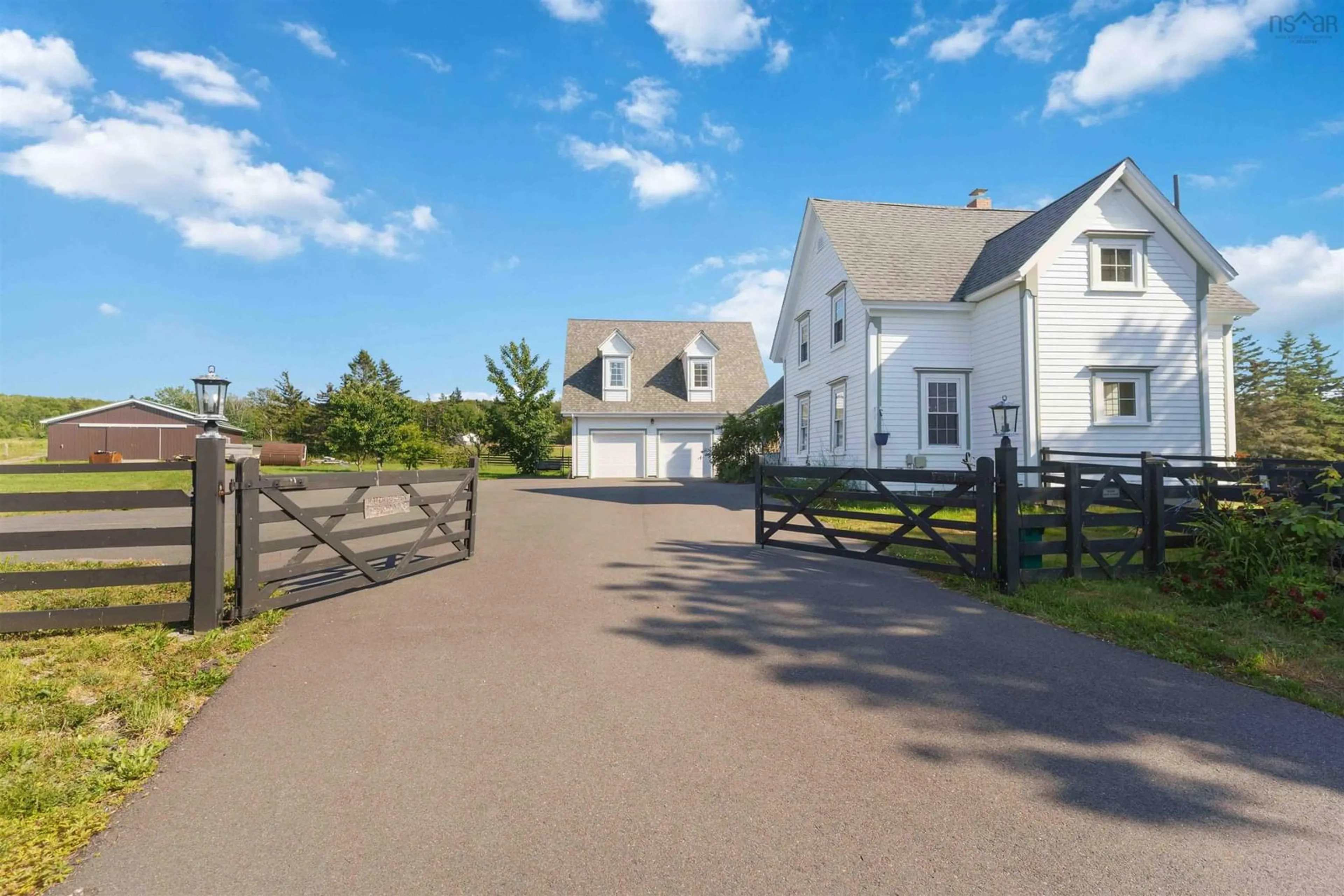 A pic from outside/outdoor area/front of a property/back of a property/a pic from drone, street for 502 Riverside Rd, New Edinburgh Nova Scotia B0W 3T0