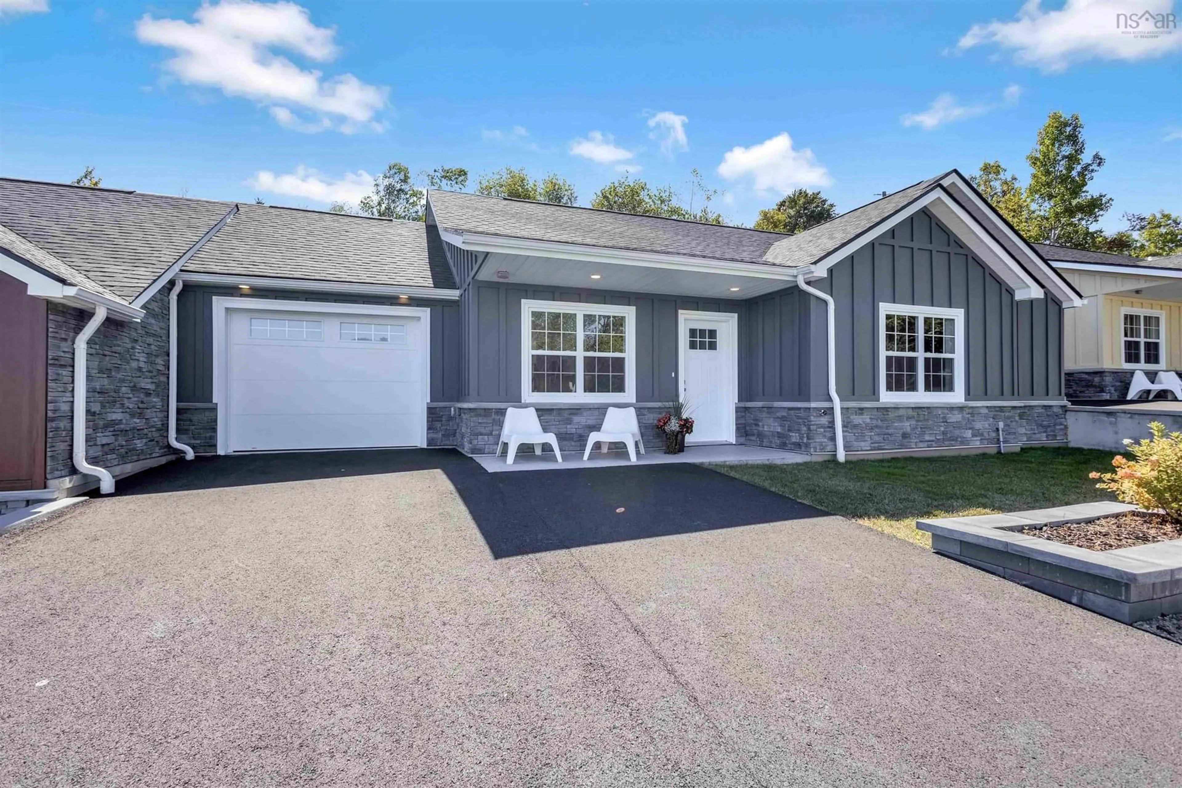 Home with vinyl exterior material, street for 9 Lions Club Rd, Fox Point Nova Scotia B0J 1T0