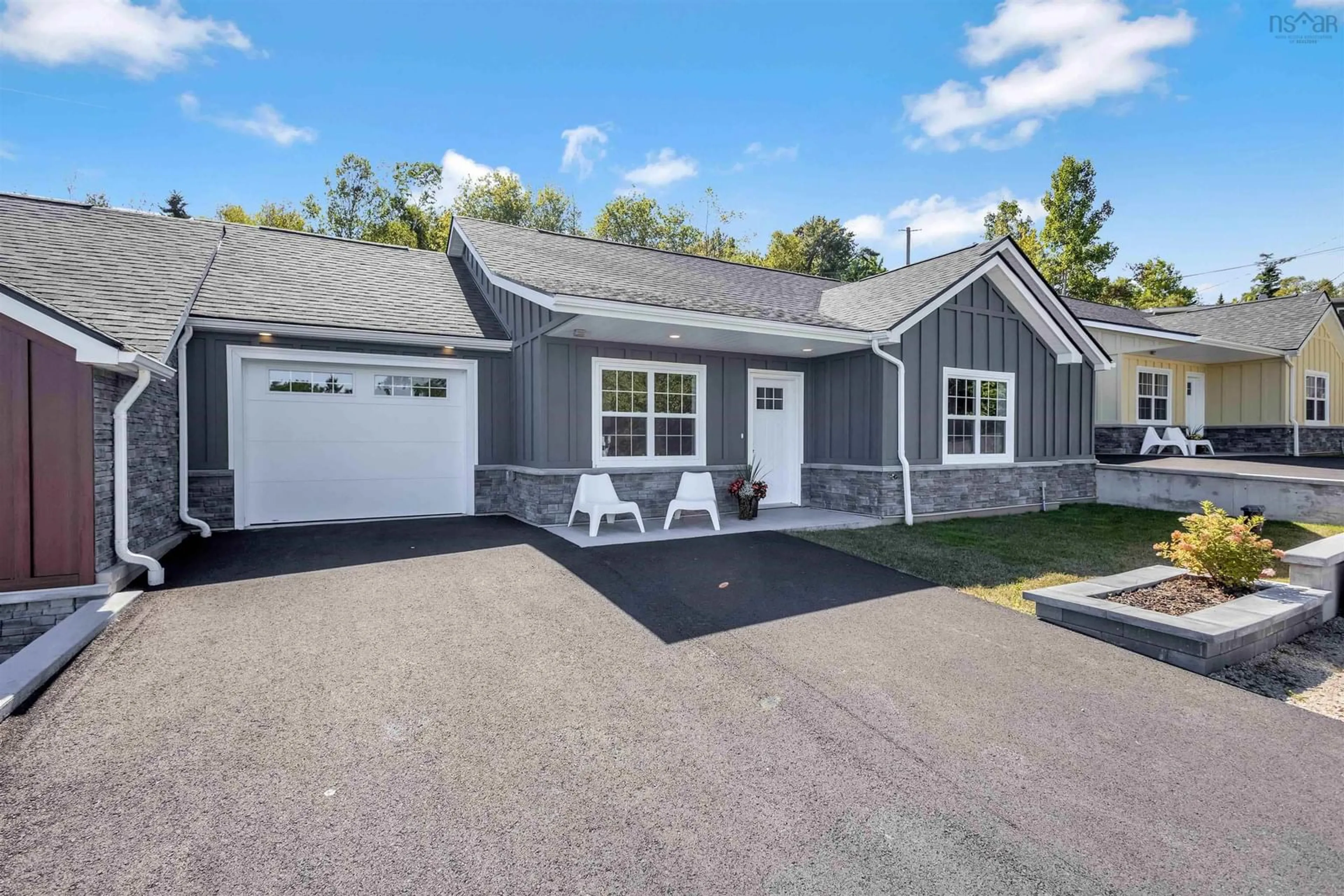 Home with vinyl exterior material, street for 9 Lions Club Rd, Fox Point Nova Scotia B0J 1T0