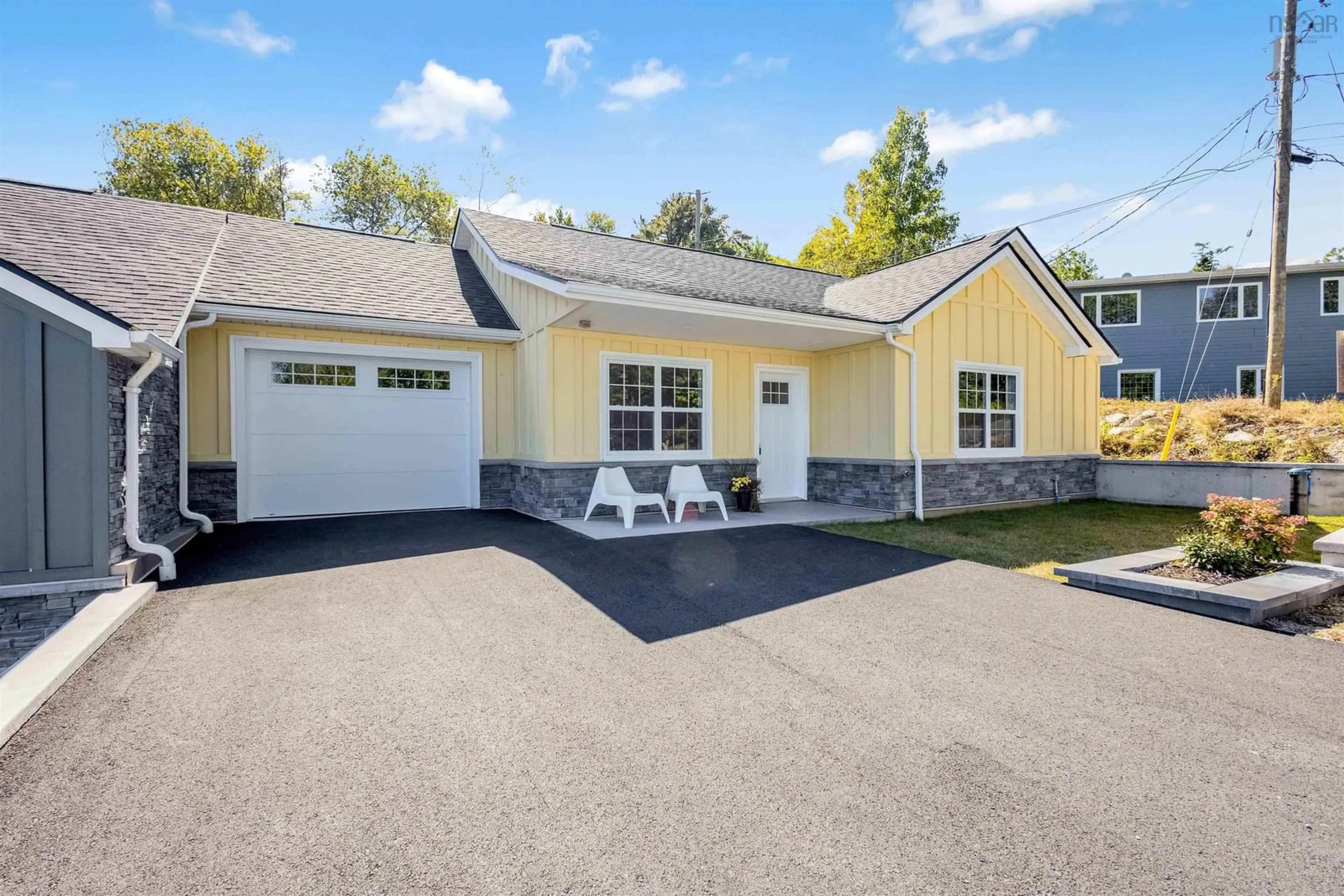 Home with vinyl exterior material, street for 11 Lions Club Rd, Fox Point Nova Scotia B0J 1T0