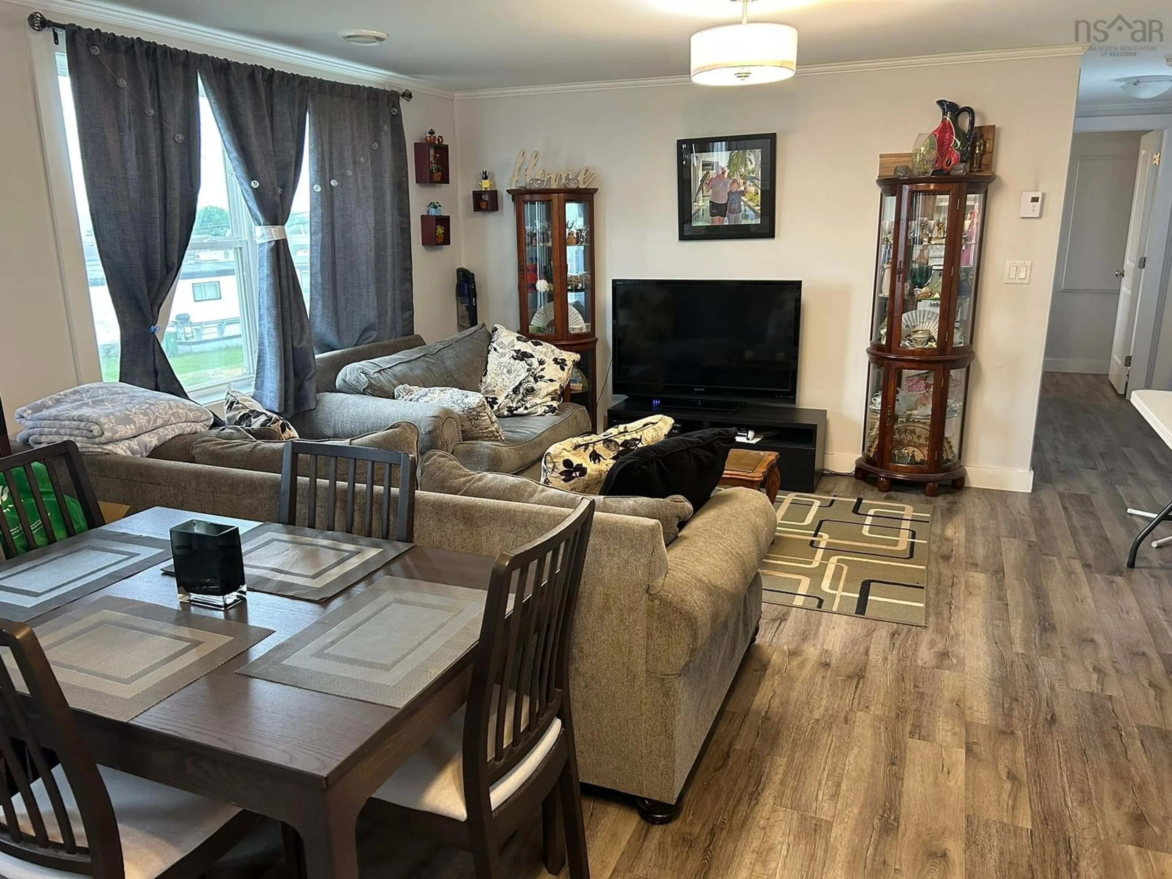 Living room with furniture, wood/laminate floor for 35 Bomber Dr, Bible Hill Nova Scotia B2N 2W5