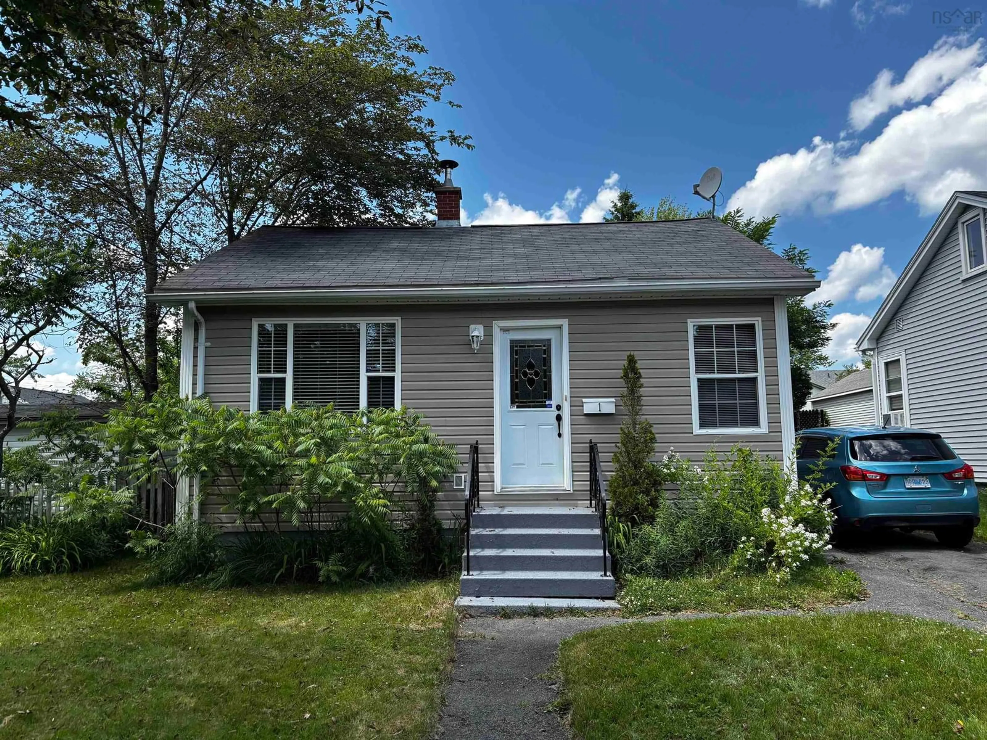 Home with vinyl exterior material, street for 1 Stairs St, Dartmouth Nova Scotia B3A 3E8