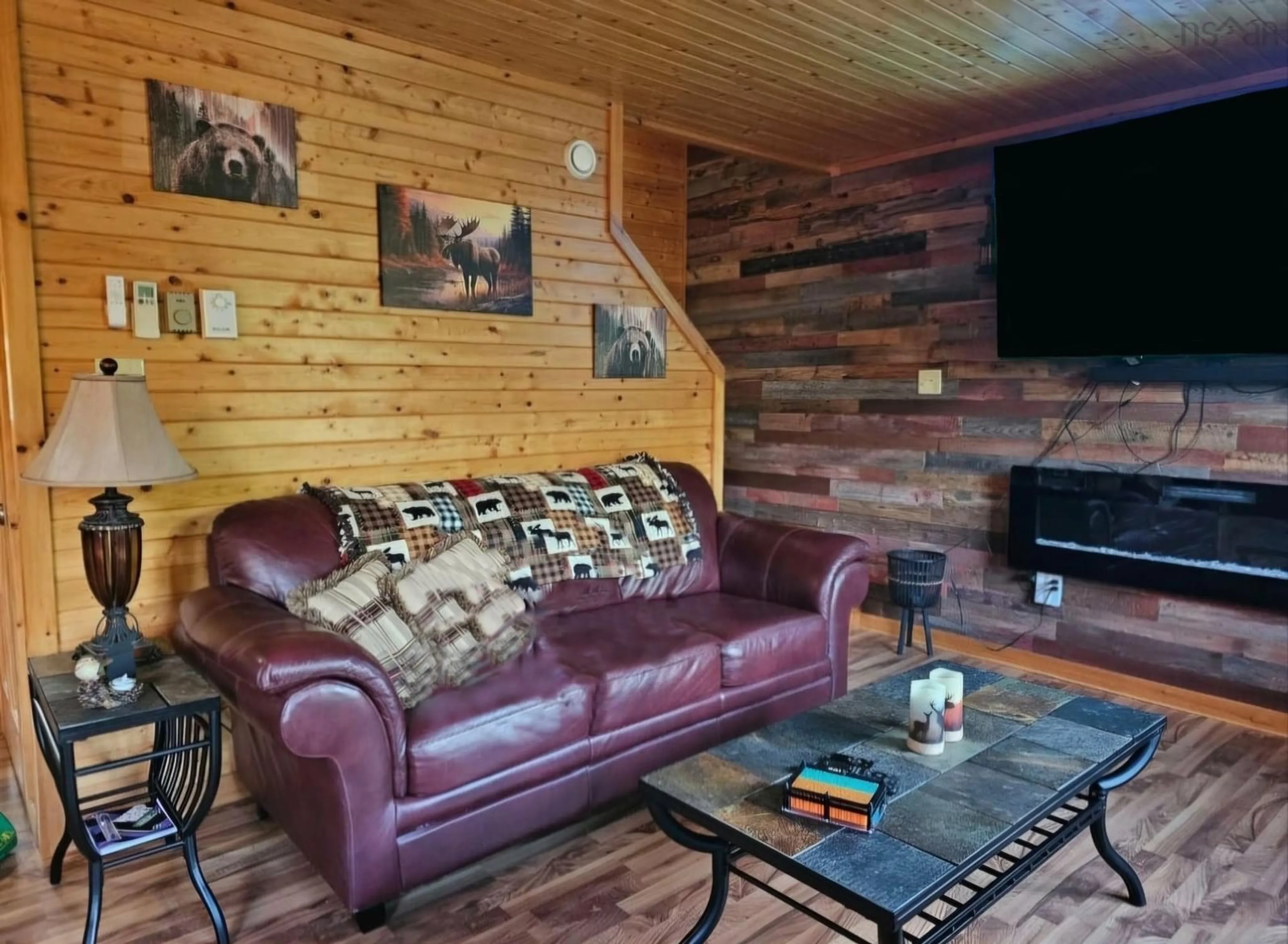 Living room with furniture, wood/laminate floor for 68 Five Island Brook Rd, Vaughan Nova Scotia B0N 2T0