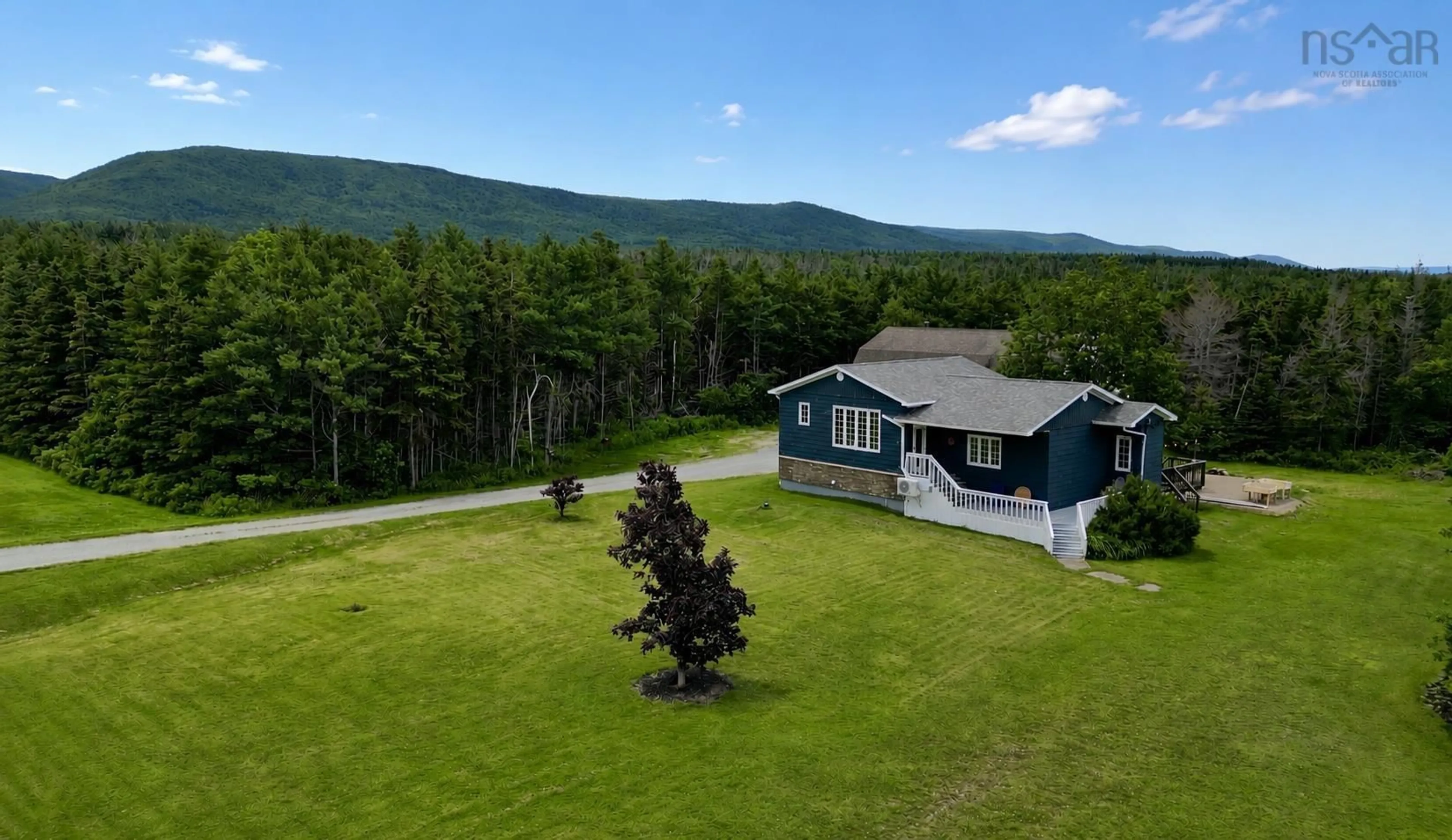 A pic from outside/outdoor area/front of a property/back of a property/a pic from drone, mountain view for 88 Pembroke Lake Road, Grand Étang Nova Scotia B0E 1L0