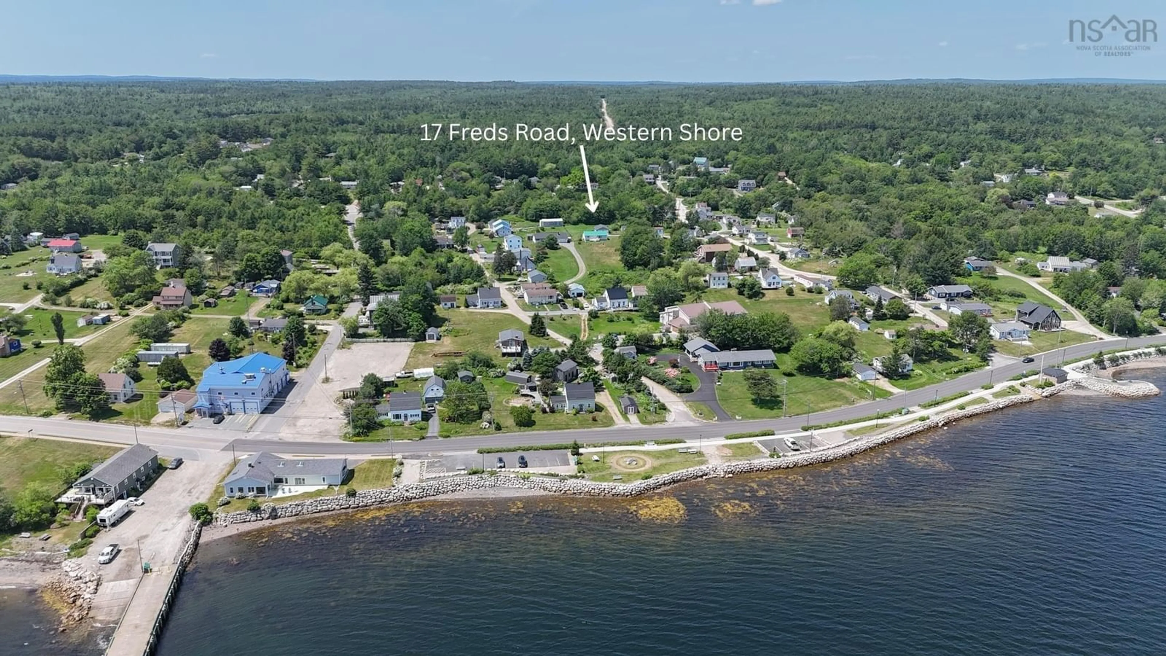 A pic from outside/outdoor area/front of a property/back of a property/a pic from drone, water/lake/river/ocean view for 17 Freds Rd, Western Shore Nova Scotia B0J 1K0