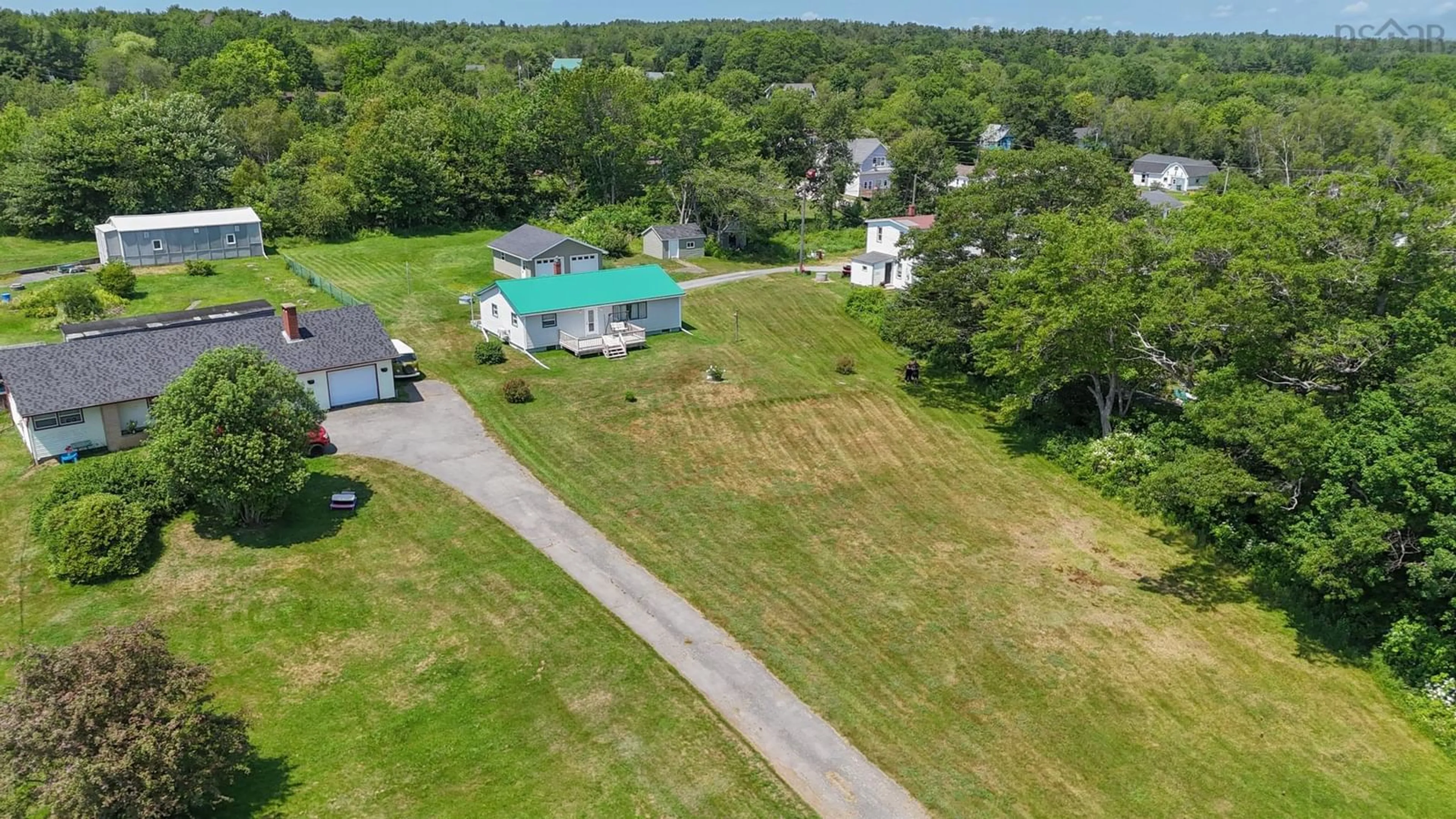 A pic from outside/outdoor area/front of a property/back of a property/a pic from drone, unknown for 17 Freds Rd, Western Shore Nova Scotia B0J 1K0