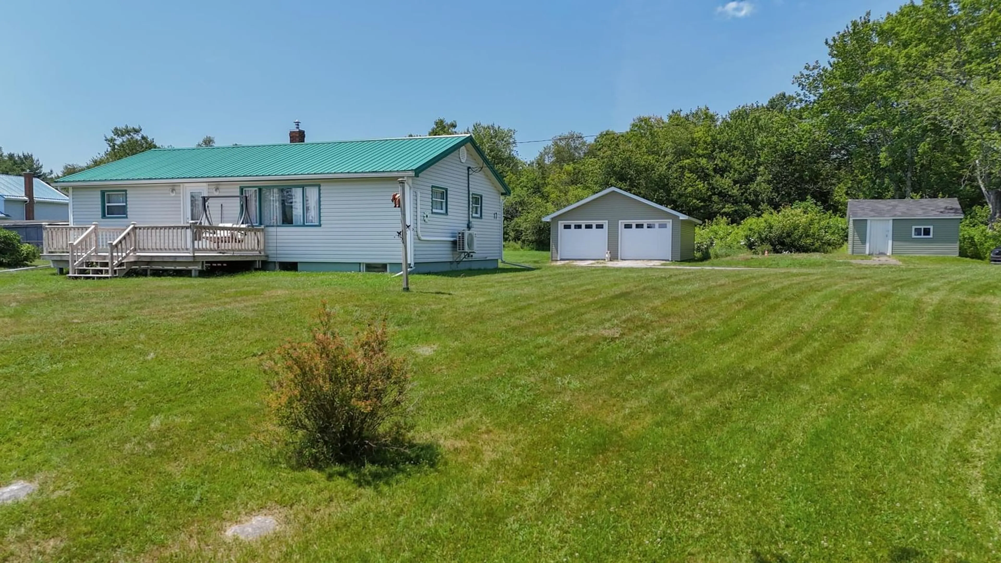 A pic from outside/outdoor area/front of a property/back of a property/a pic from drone, water/lake/river/ocean view for 17 Freds Rd, Western Shore Nova Scotia B0J 1K0