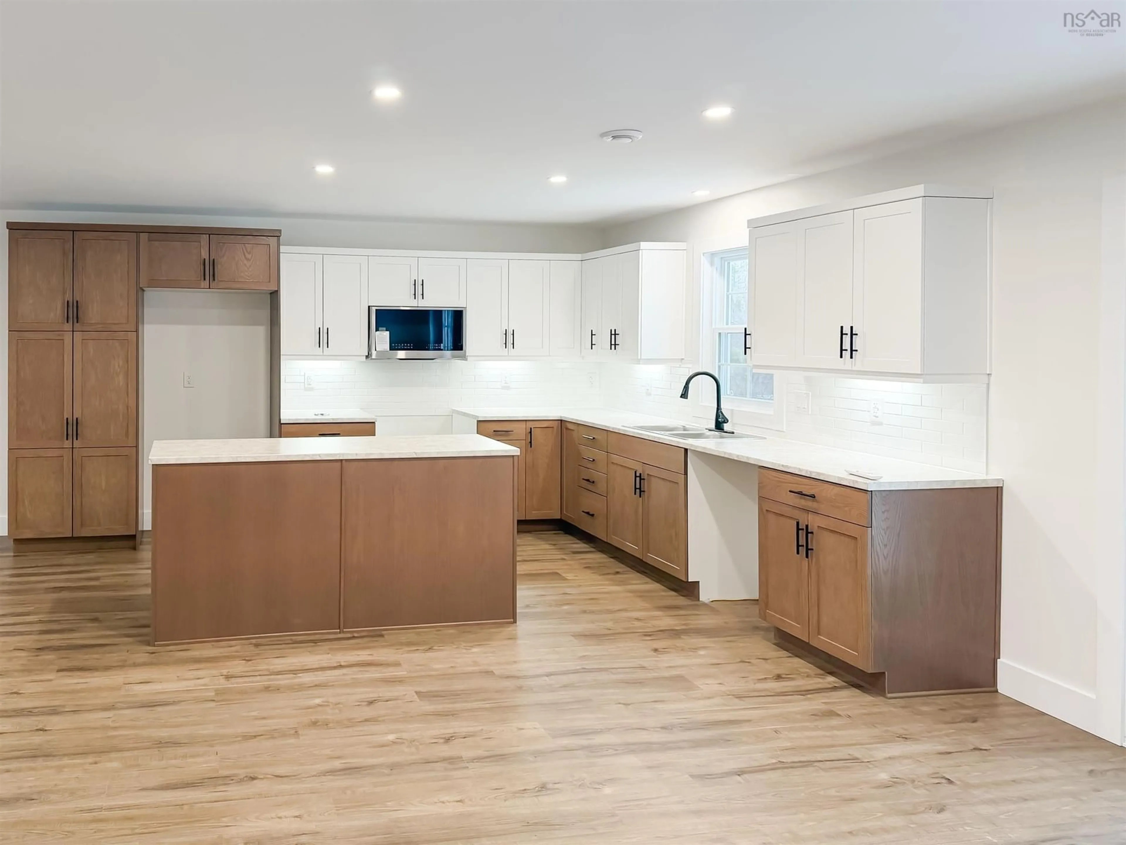 Open concept kitchen, unknown for 45 Al Bennett Rd, Halls Harbour Nova Scotia B0P 1J0