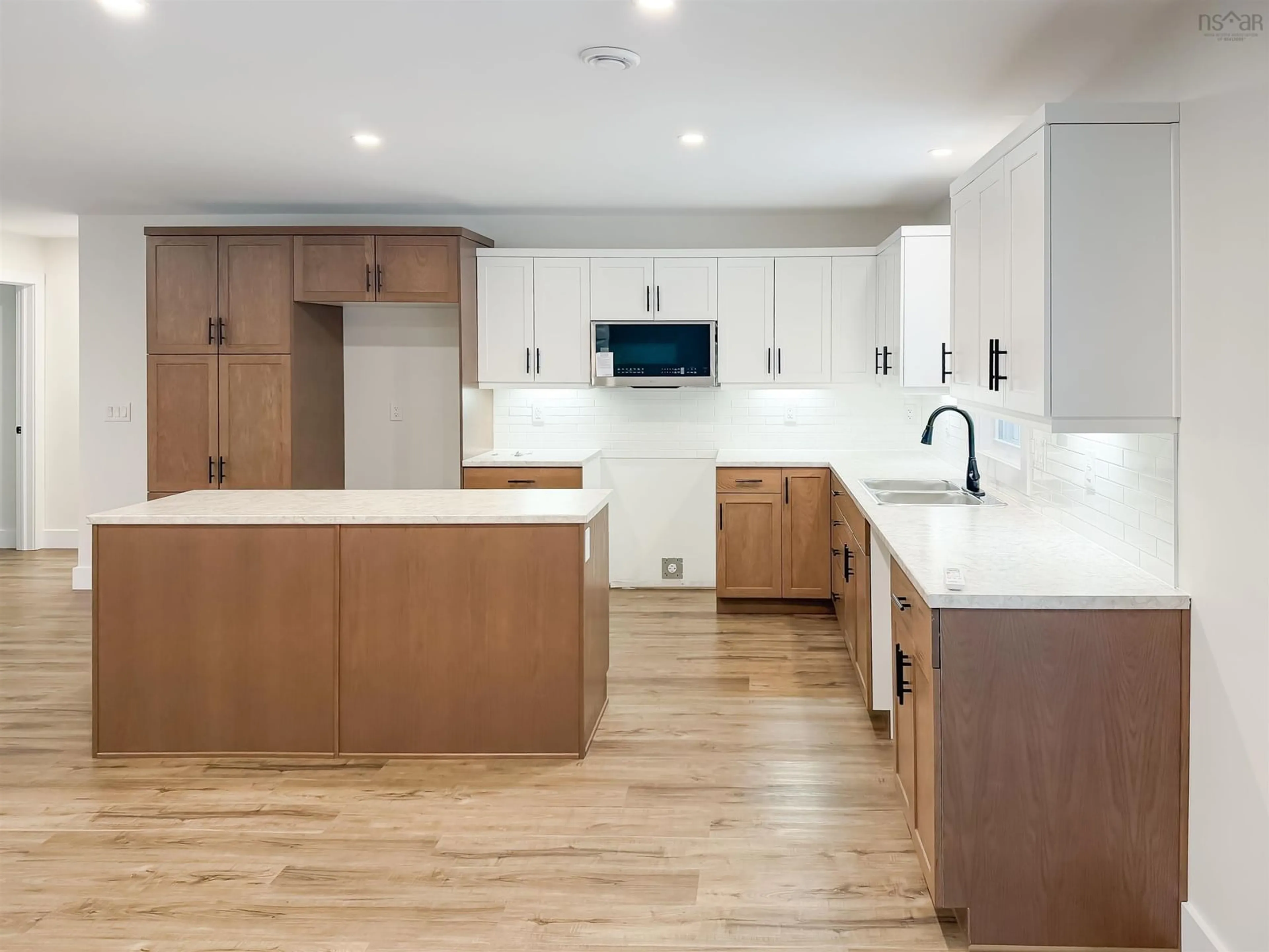 Open concept kitchen, unknown for 45 Al Bennett Rd, Halls Harbour Nova Scotia B0P 1J0