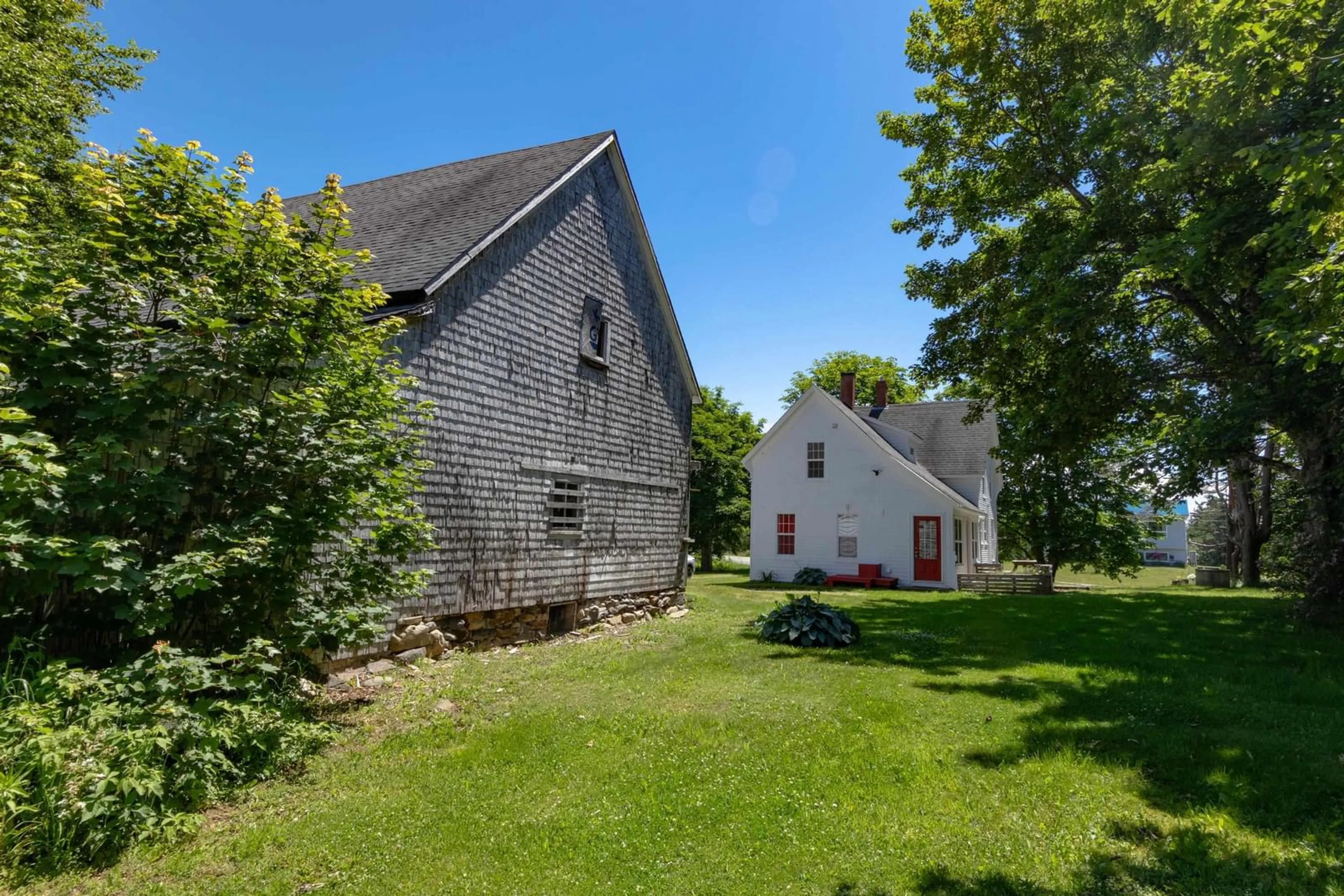 A pic from outside/outdoor area/front of a property/back of a property/a pic from drone, street for 691 Bear Cove Road, St. Alphonse Nova Scotia B0W 2J0