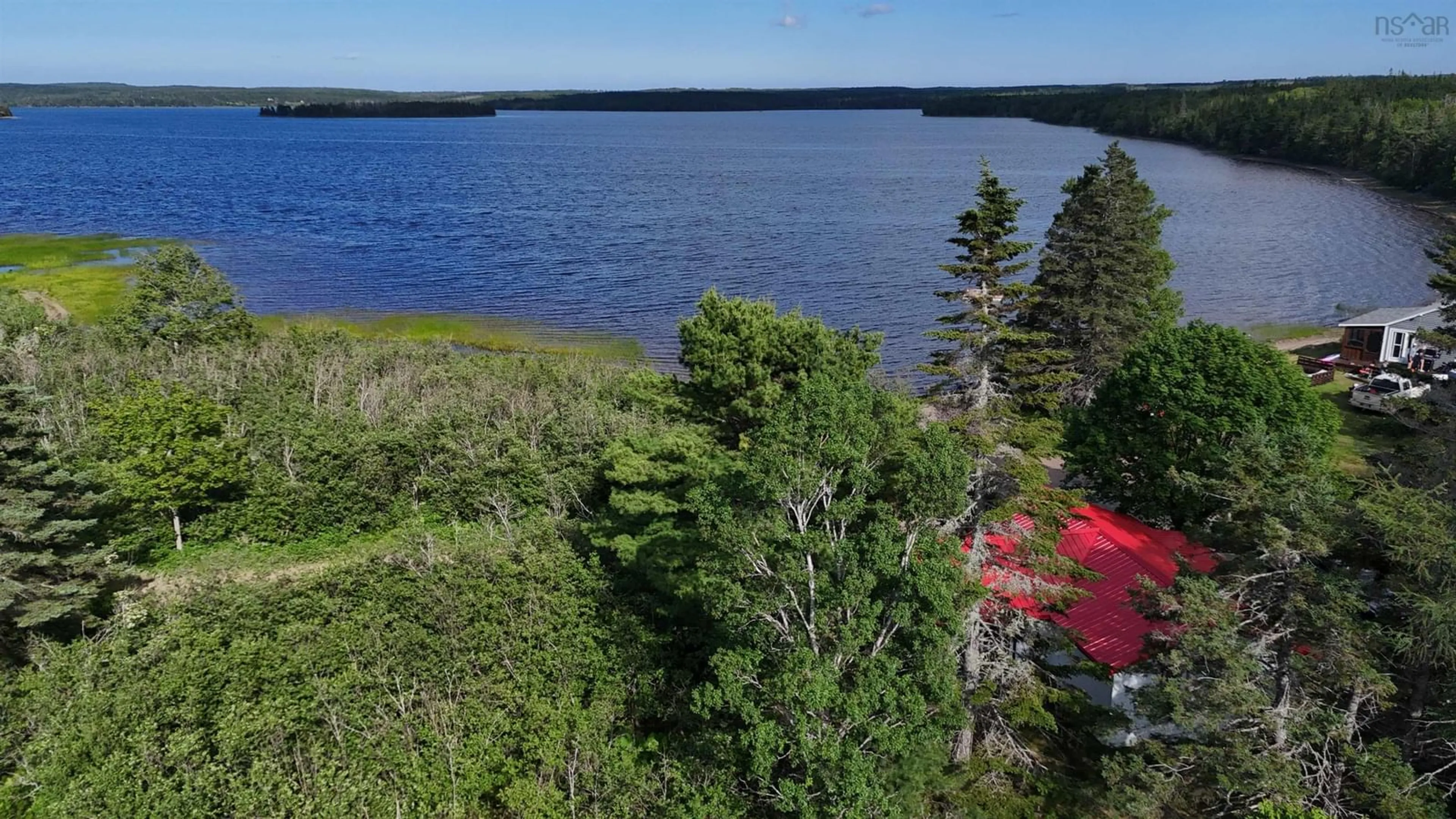A pic from outside/outdoor area/front of a property/back of a property/a pic from drone, water/lake/river/ocean view for 82 Golden River Rd, Loch Lomond Nova Scotia B2E 1B2