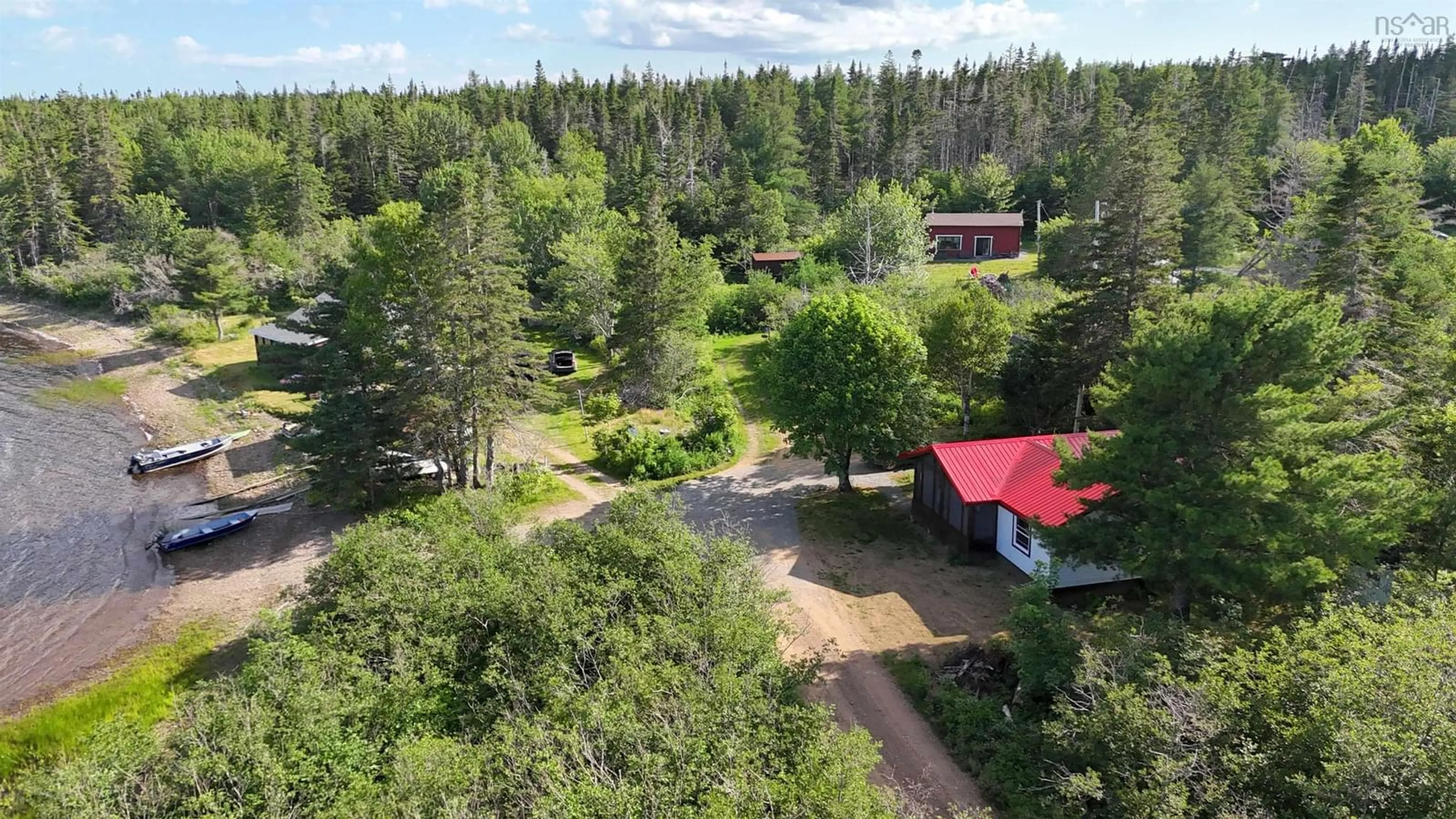 A pic from outside/outdoor area/front of a property/back of a property/a pic from drone, forest/trees view for 82 Golden River Rd, Loch Lomond Nova Scotia B2E 1B2
