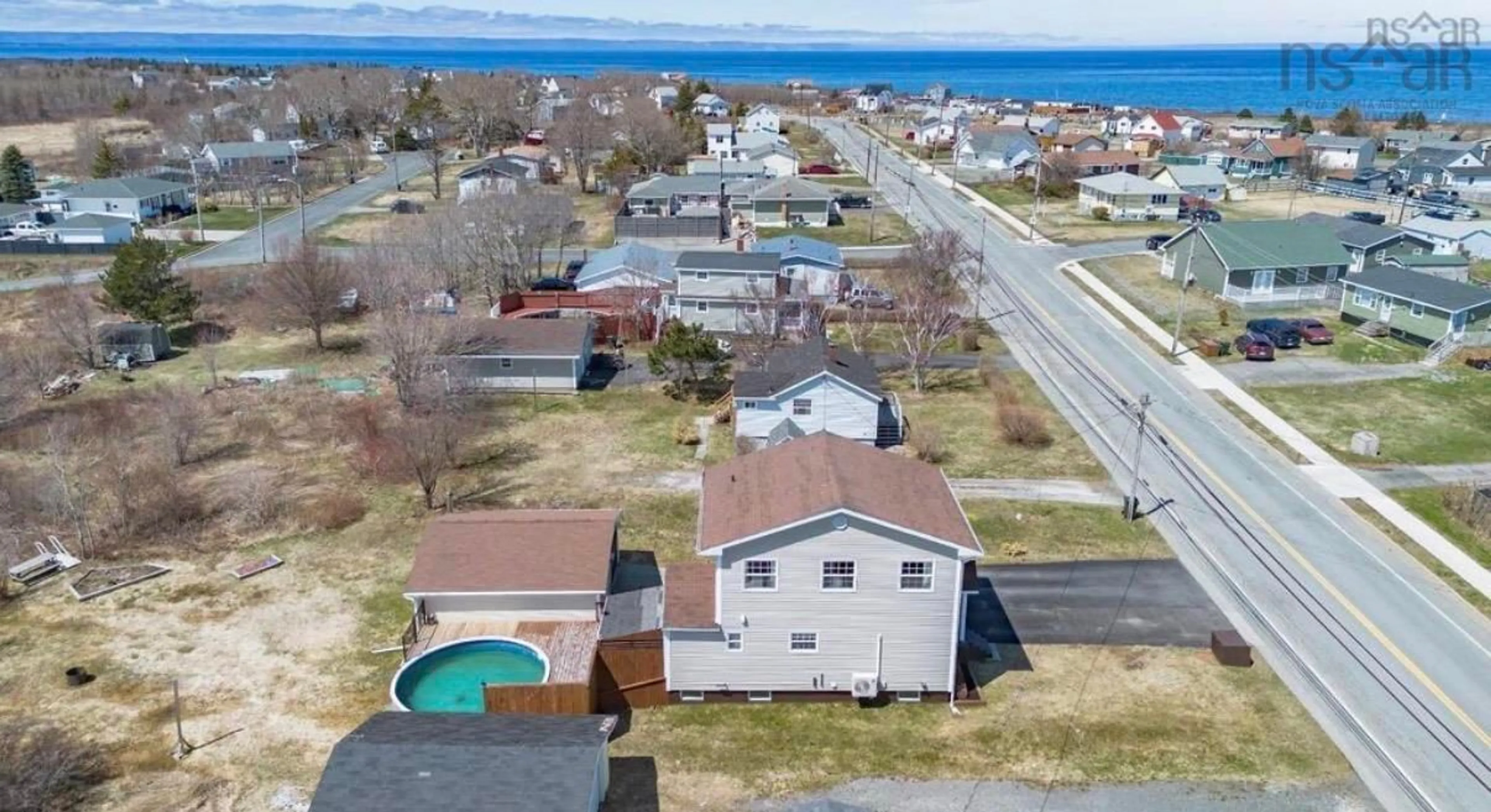 A pic from outside/outdoor area/front of a property/back of a property/a pic from drone, water/lake/river/ocean view for 3752 Ellsworth Ave, New Waterford Nova Scotia B1H 2H8