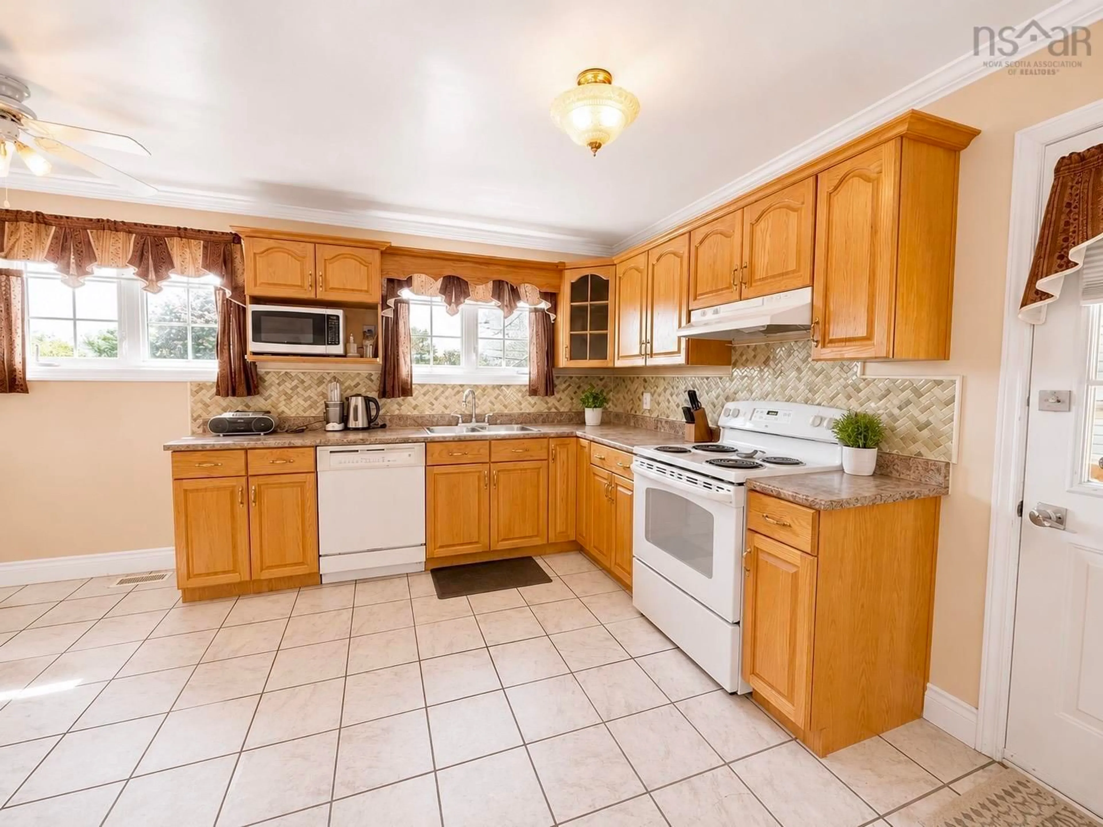 Standard kitchen, ceramic/tile floor for 136 Flying Cloud Dr, Forest Hills Nova Scotia B2W 4V7