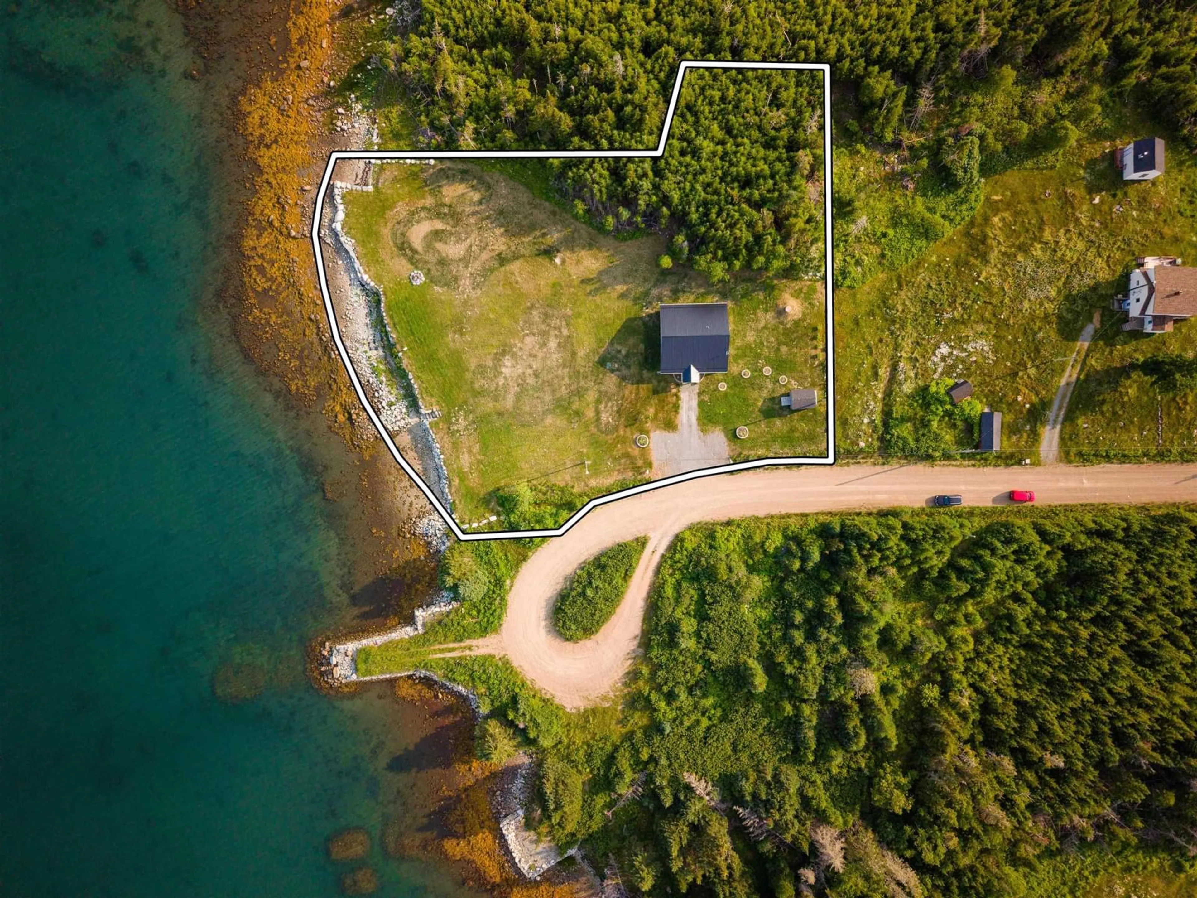A pic from outside/outdoor area/front of a property/back of a property/a pic from drone, water/lake/river/ocean view for 42 Liscomb Wharf Rd, Liscomb Nova Scotia B0J 2A0