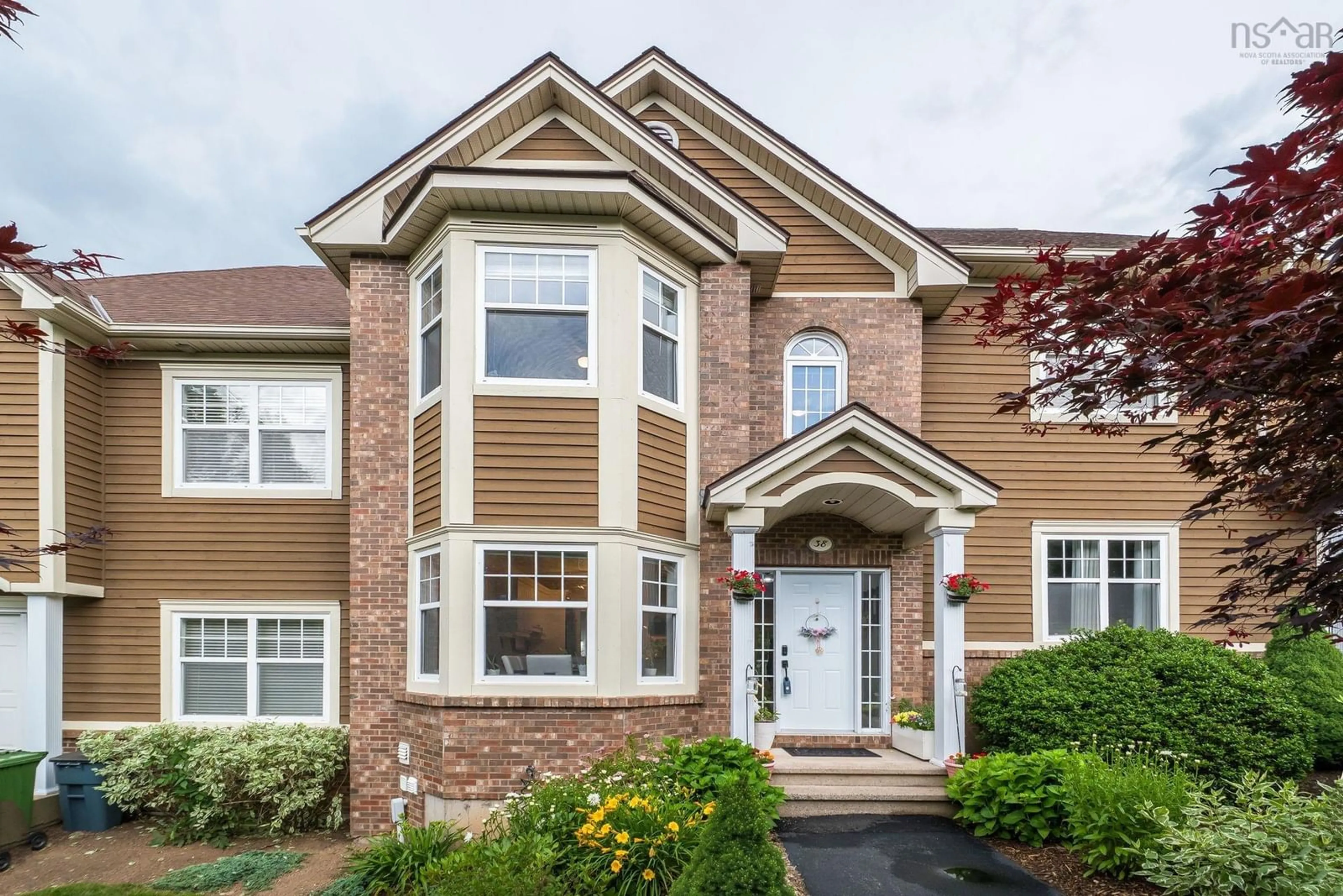 Home with brick exterior material, street for 38 Greenside Lane, Hammonds Plains Nova Scotia B4B 2A1