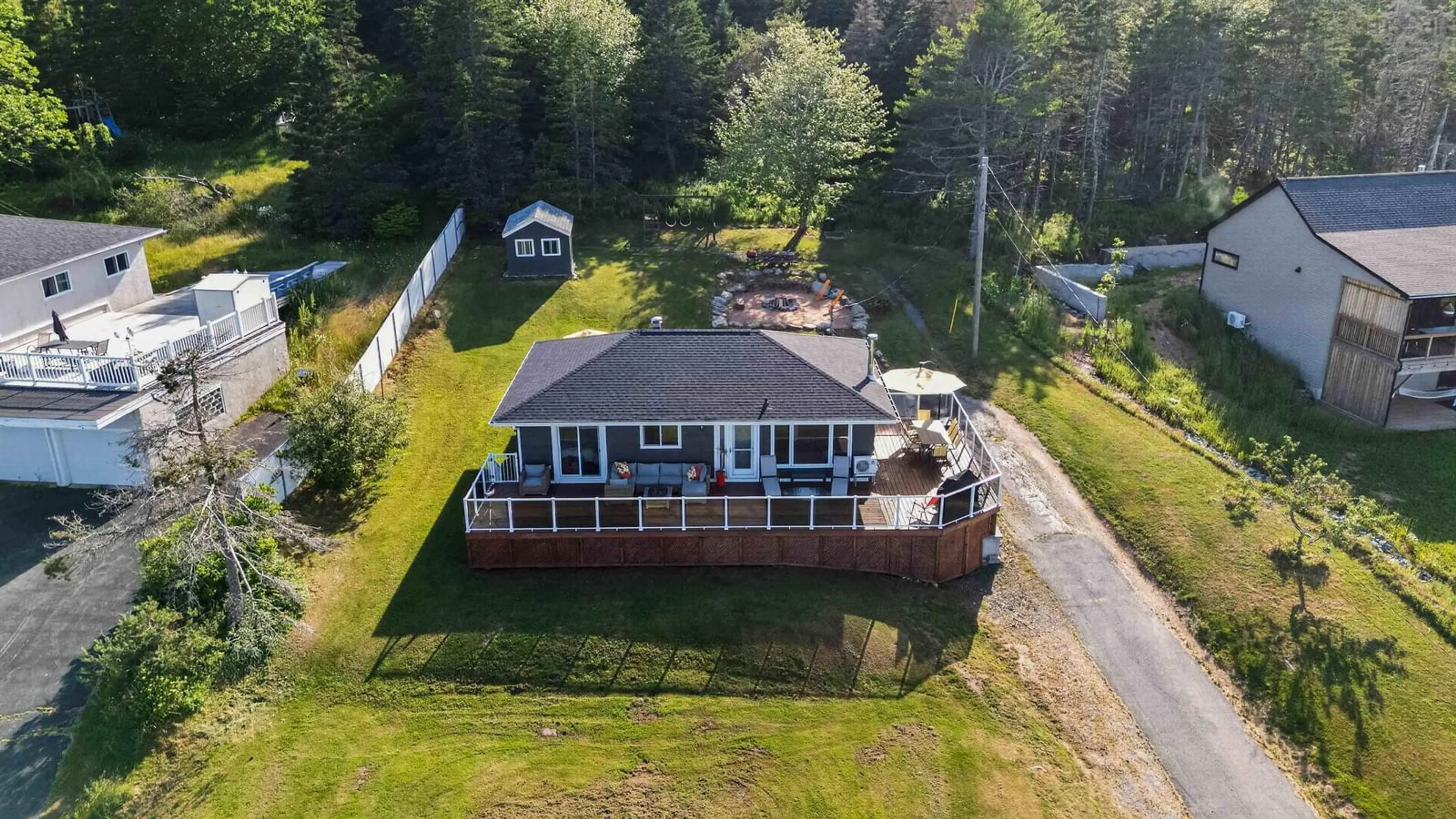 A pic from outside/outdoor area/front of a property/back of a property/a pic from drone, water/lake/river/ocean view for 2325 Crowell Rd, East Lawrencetown Nova Scotia B2Z 1P3