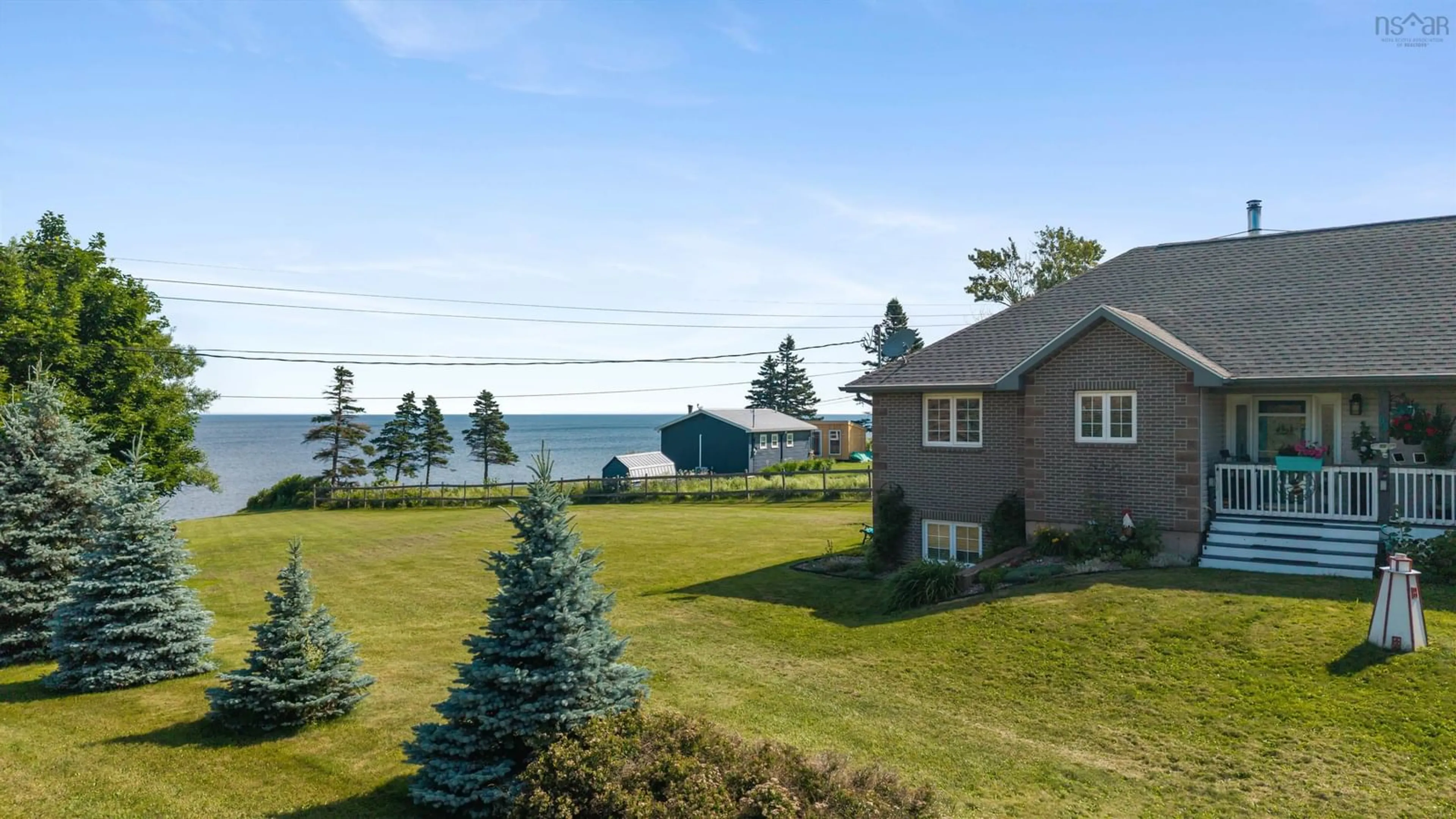 A pic from outside/outdoor area/front of a property/back of a property/a pic from drone, water/lake/river/ocean view for 98 Ocean Front Dr, Gulf Shore Nova Scotia B0K 1L0