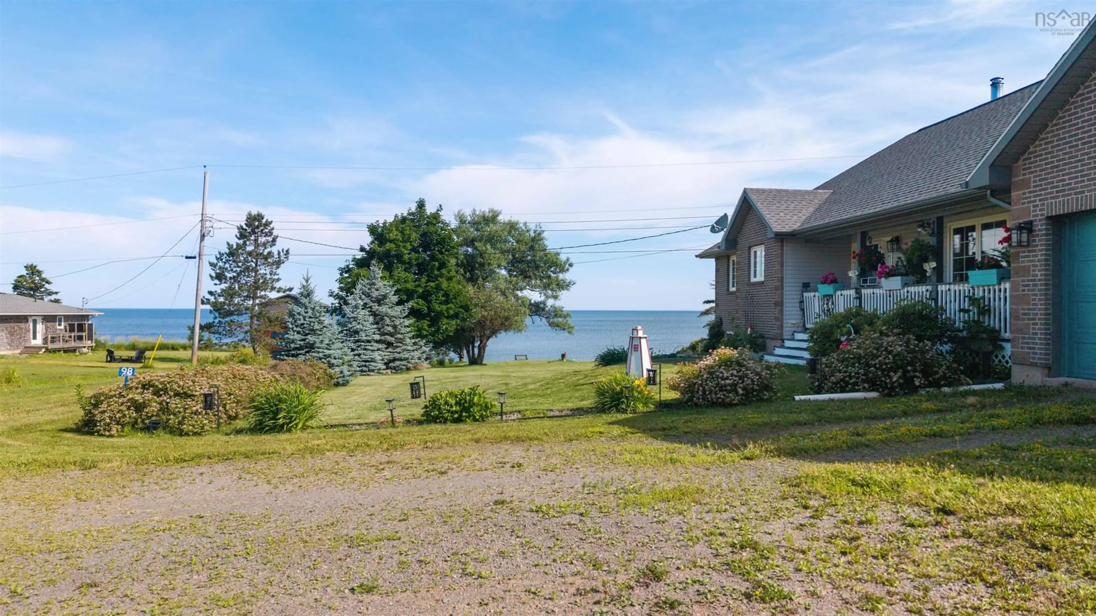 A pic from outside/outdoor area/front of a property/back of a property/a pic from drone, water/lake/river/ocean view for 98 Ocean Front Dr, Gulf Shore Nova Scotia B0K 1L0